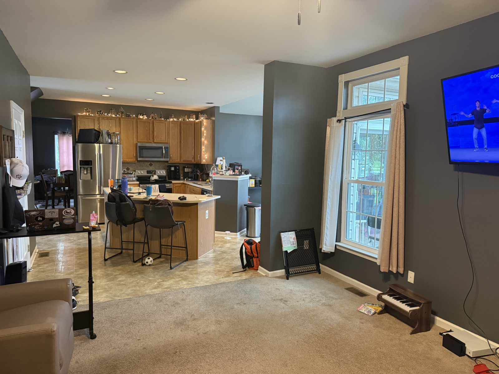 Living Room w/ 2 couches and 2 chairs.