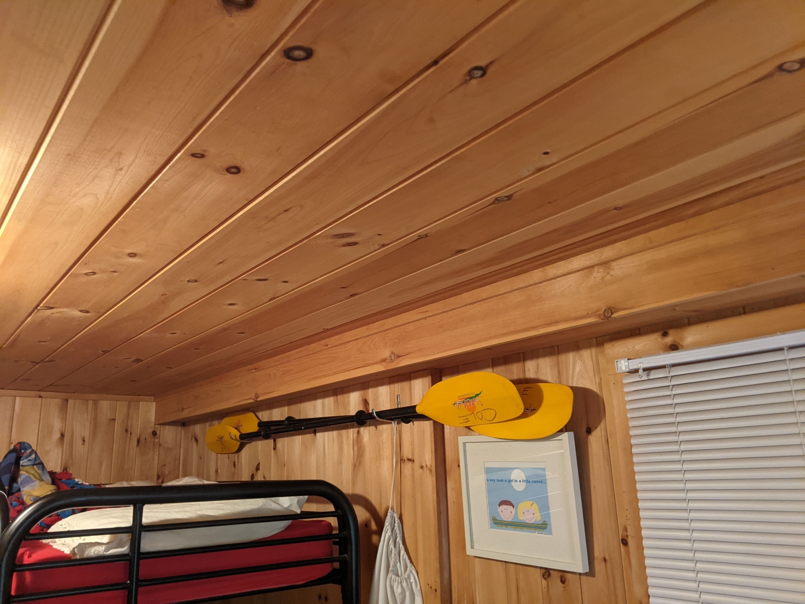 Family cabin at former sleepaway camp with docks, kayaks, and field
