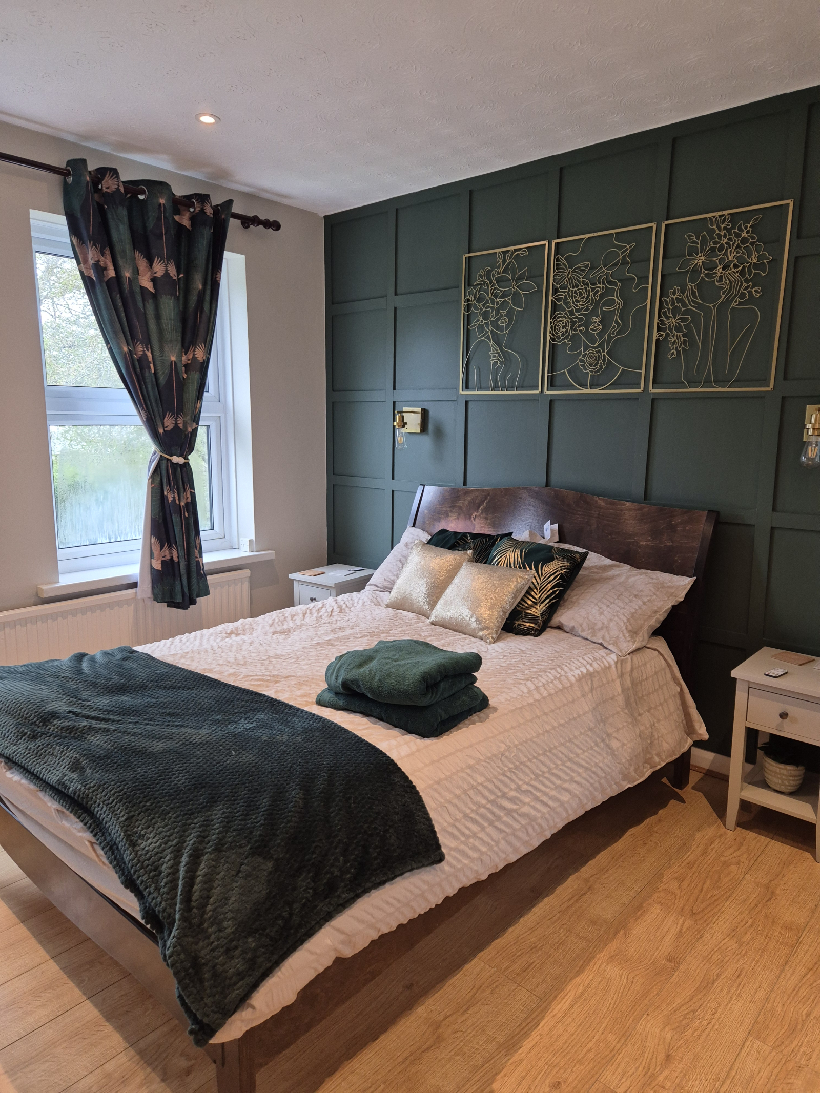 Master bedroom with ensuite bathroom. Ensuite bathroom with frosted glass door. Standard size double bed. Fitted wardrobes with plenty of storage. Garden facing.  Lovely calming bedroom.