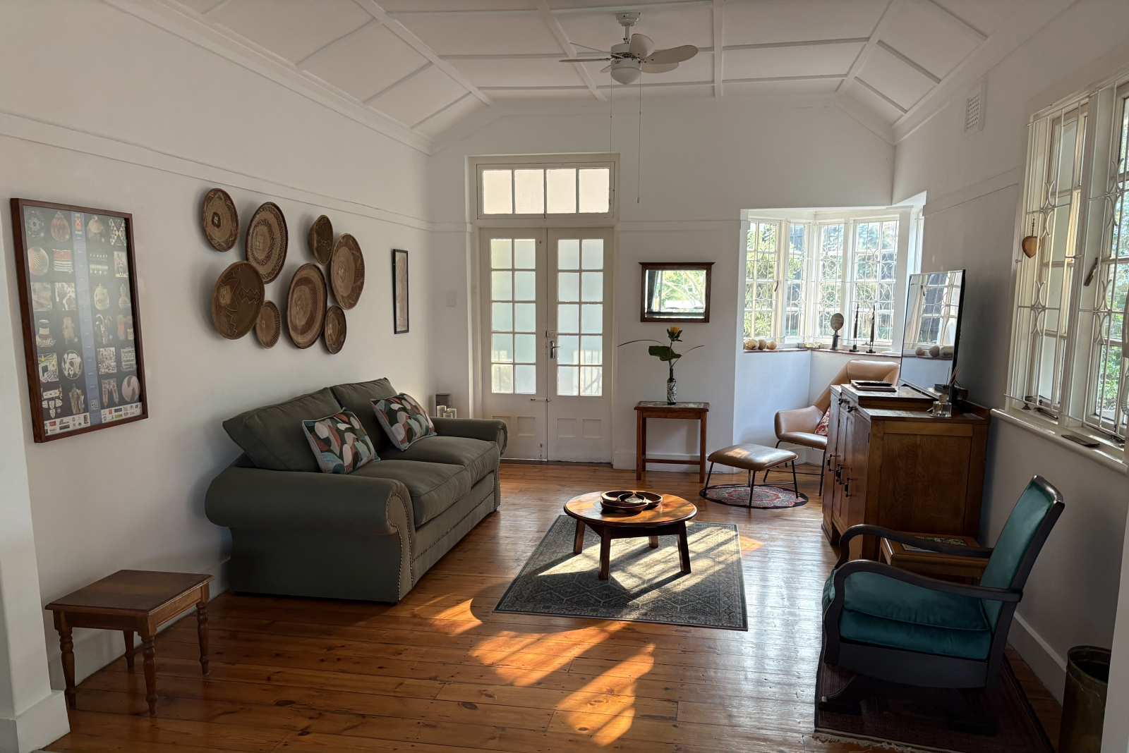 Lounge with sleeper couch, bay window and smart TV