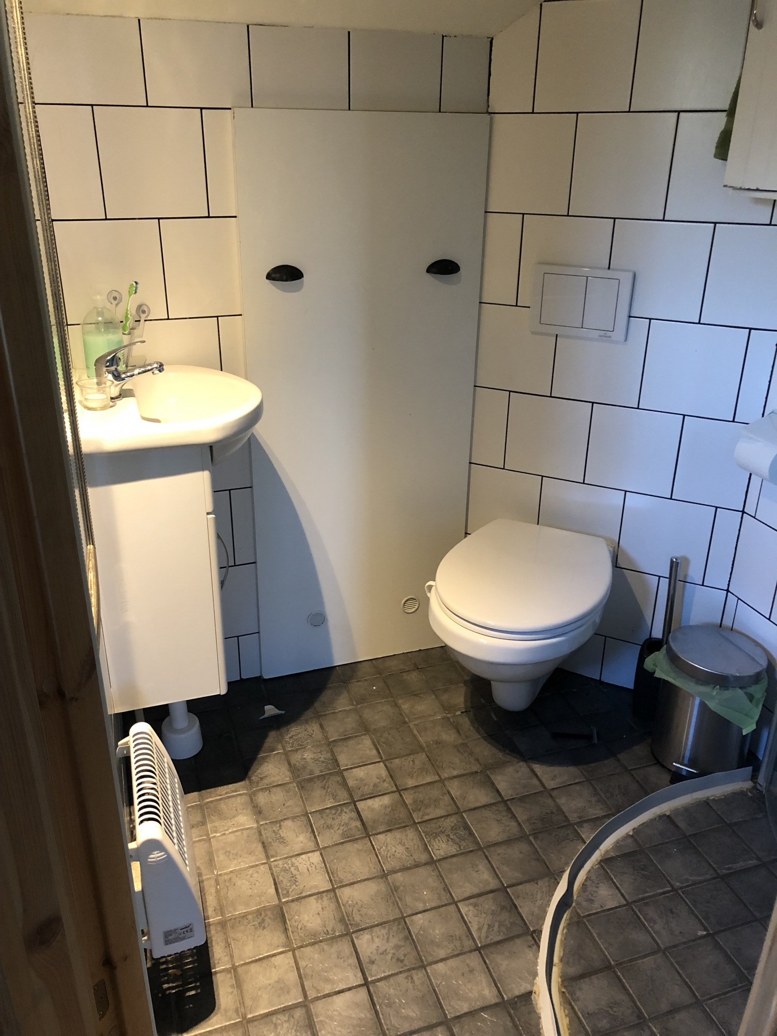Bath room with toilet and shower