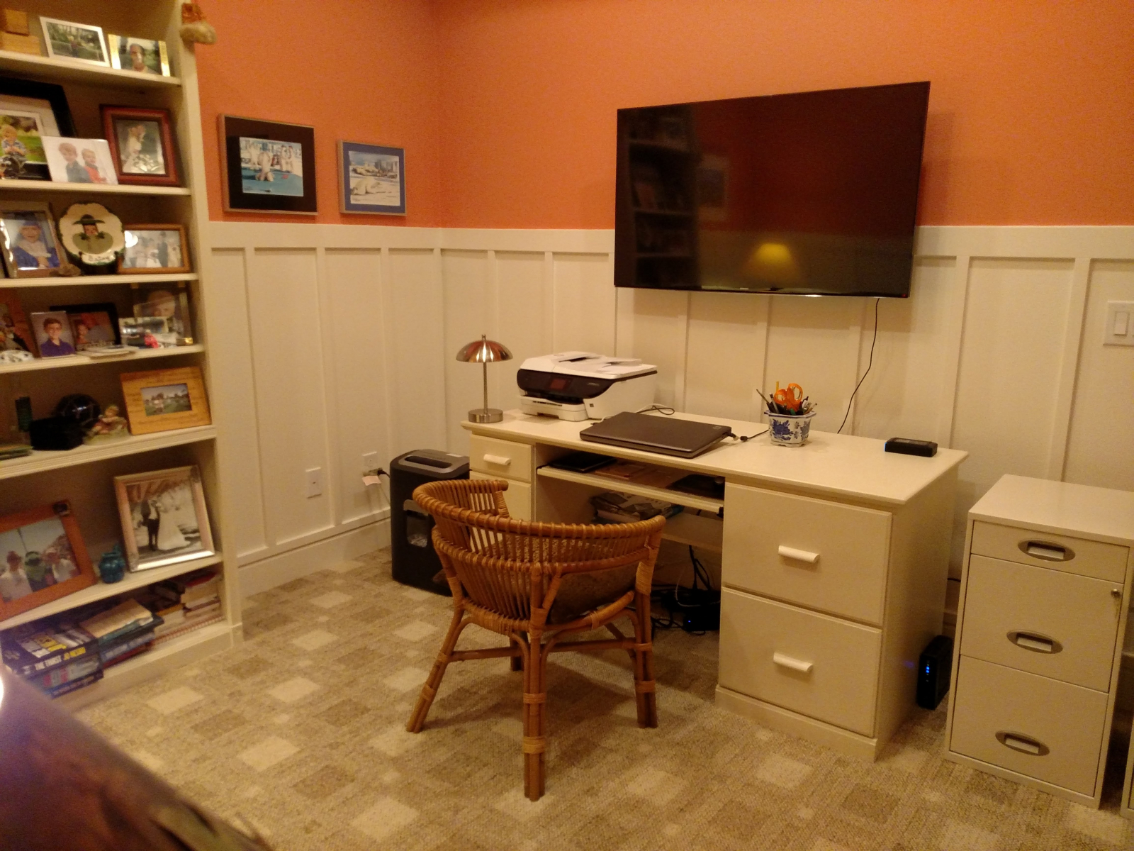 Watch TV or read in the quiet den with workspace.
