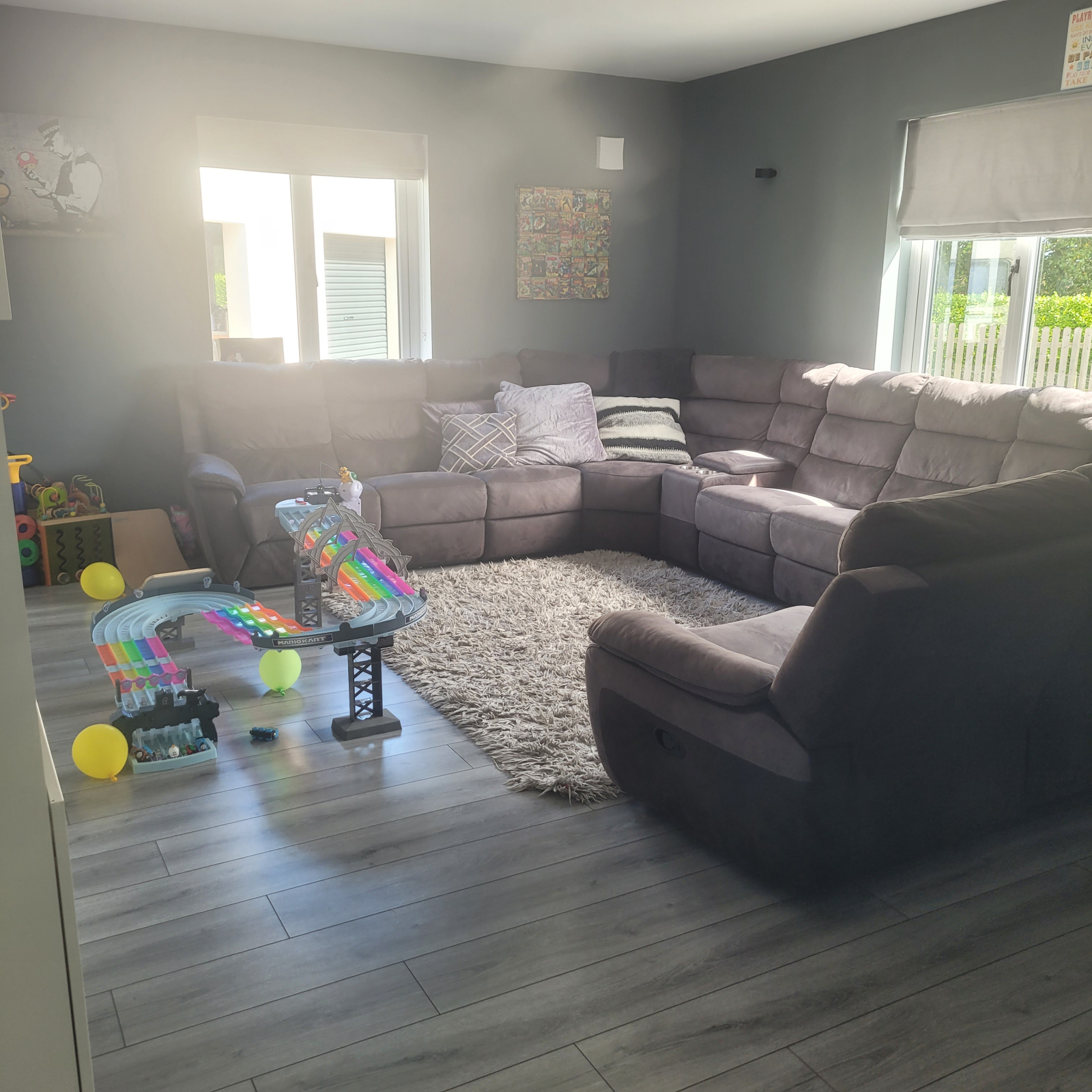 playroom with large sofa and 65inch TV