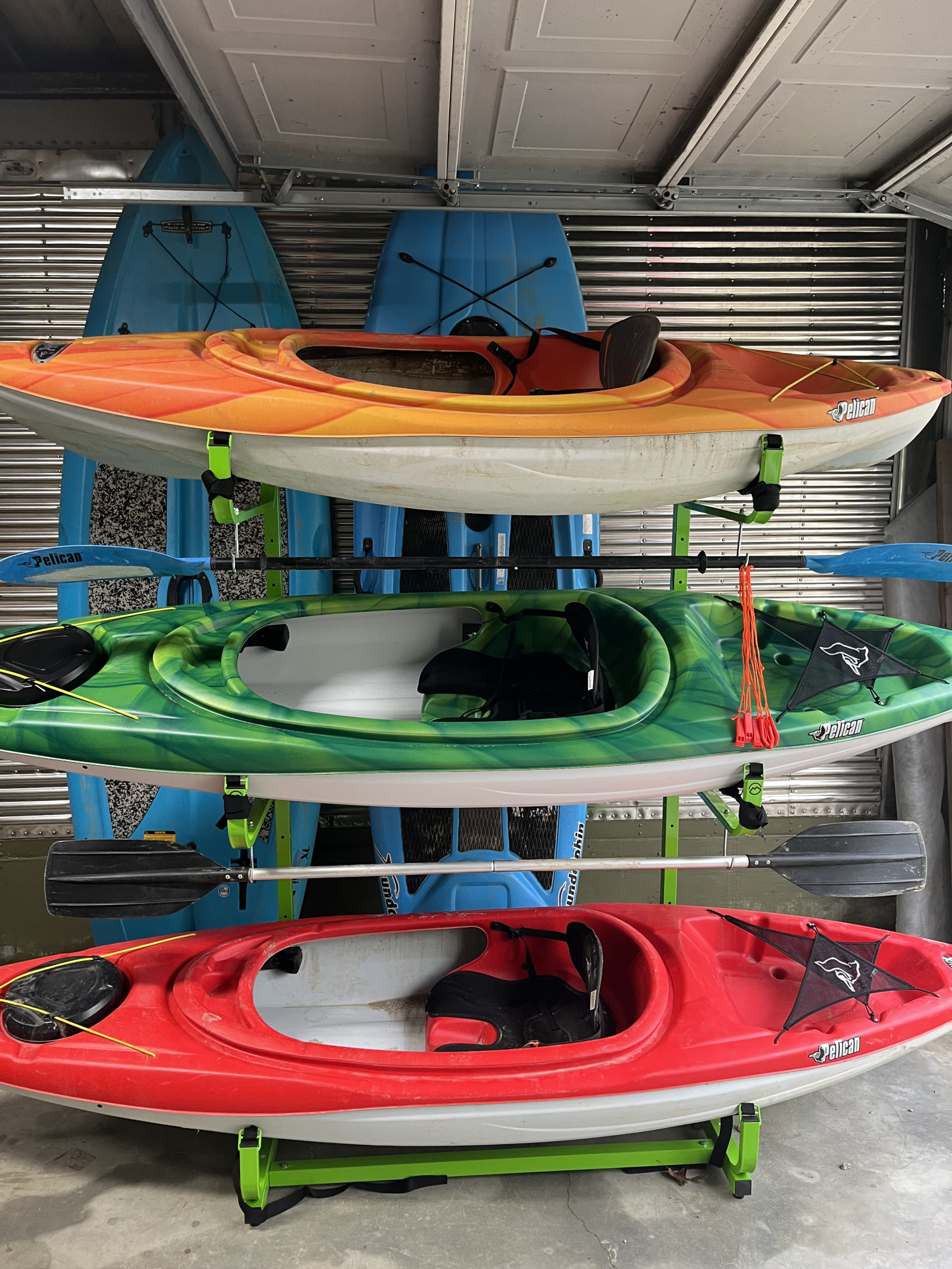 Kayaks and paddleboards with life jackets to venture out on the peaceful Creek into the Tennessee Ri ...