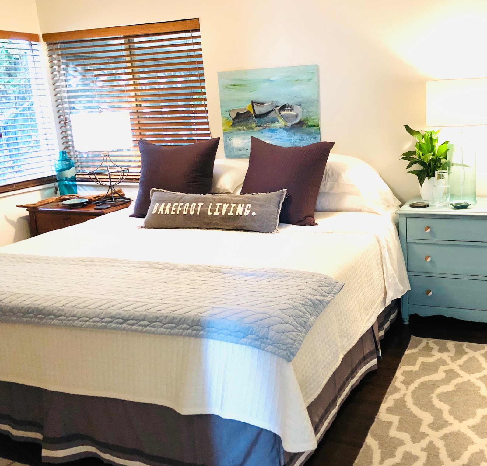King bedroom with a peek-a-boo view of the ocean.