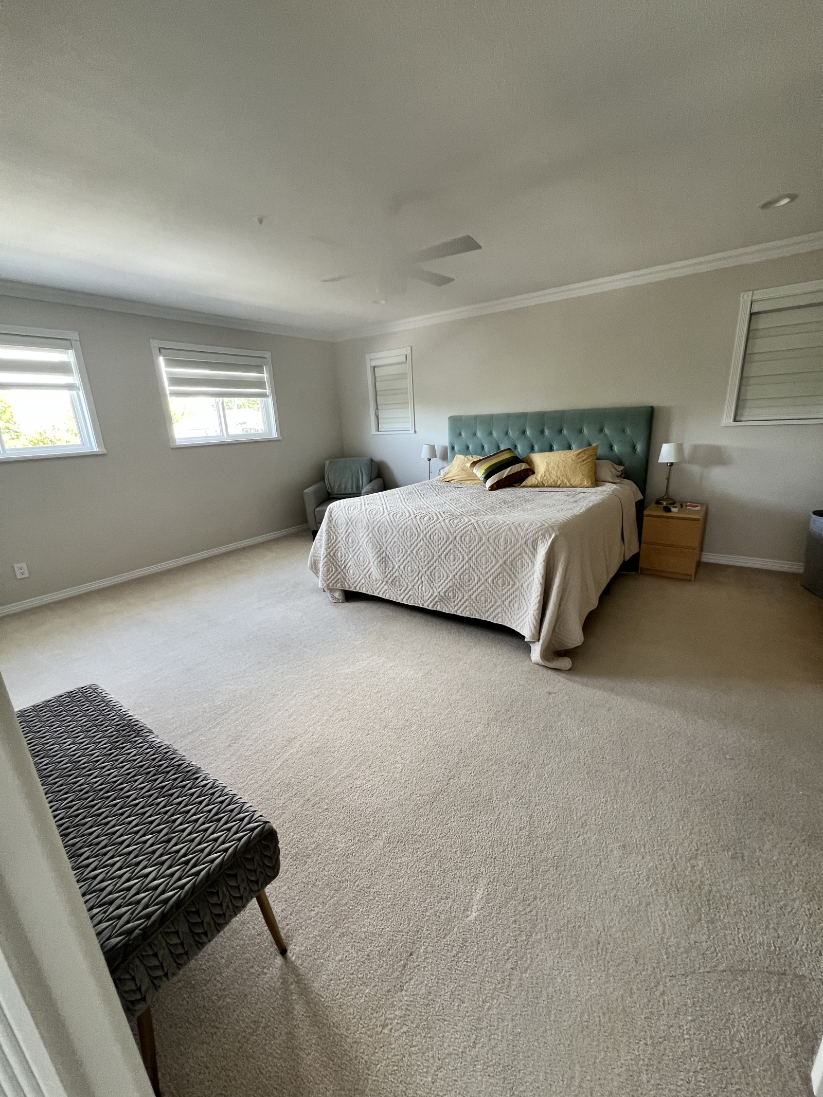 Primary bedroom with king bed and bedroom balcony