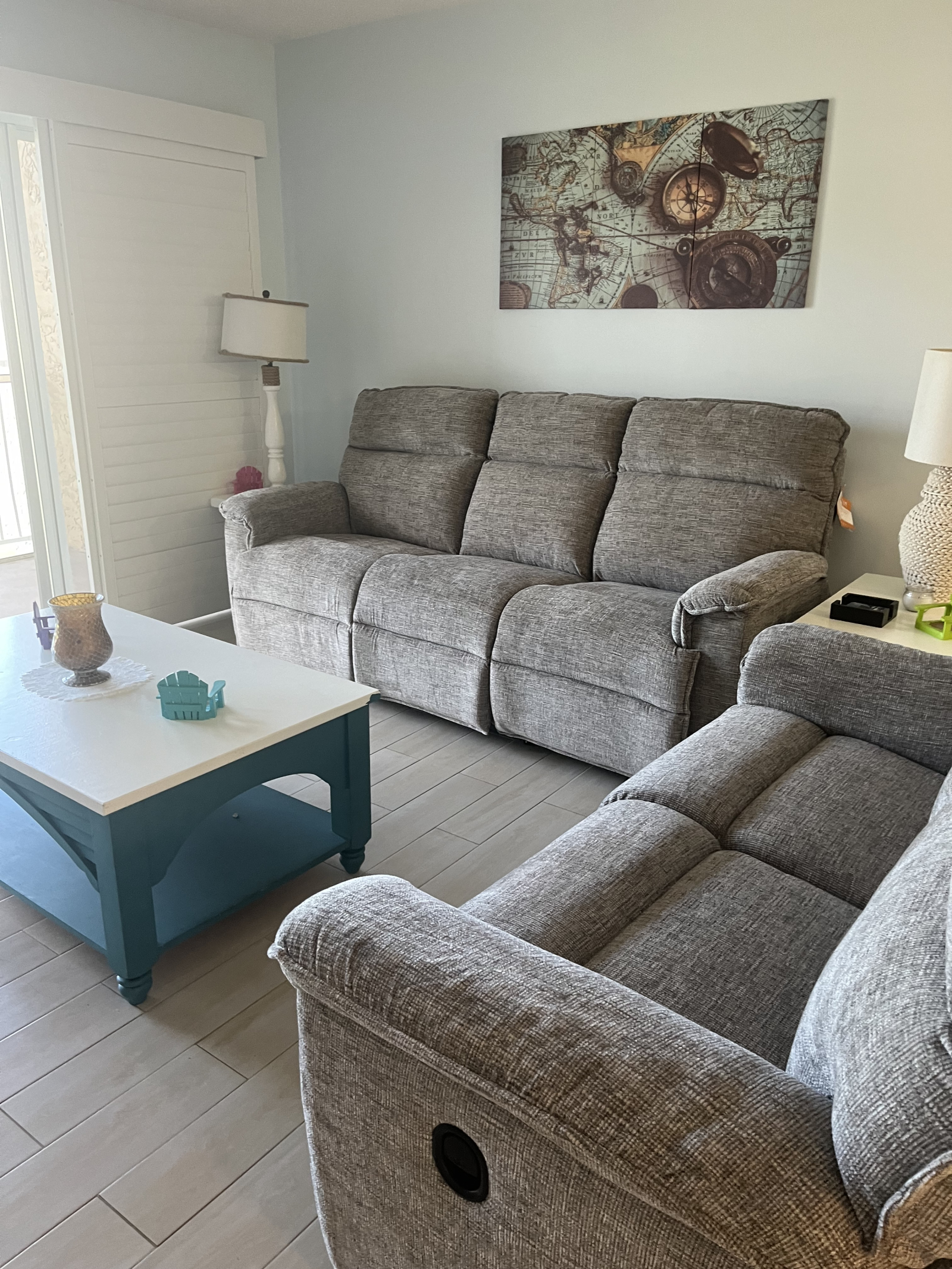 Living room couch have power recliner and love seat has manual recliner