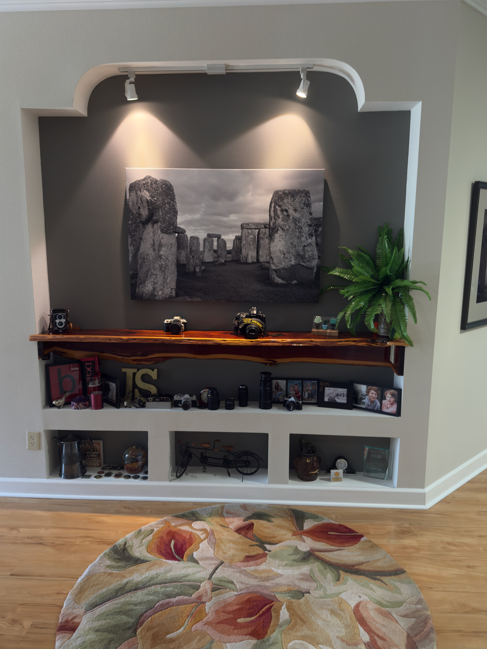 Jim is a serious black and white photographer and the home is filled with his work of photos from ar ...