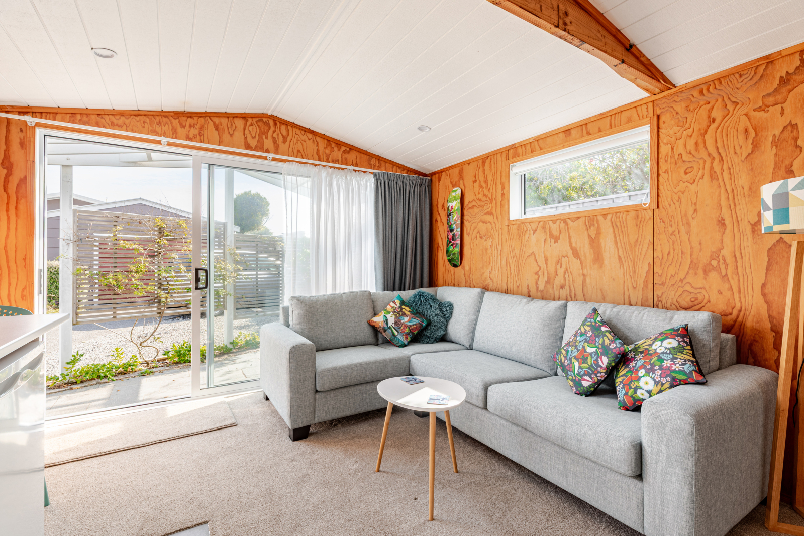 Living space opens onto sunny patio.