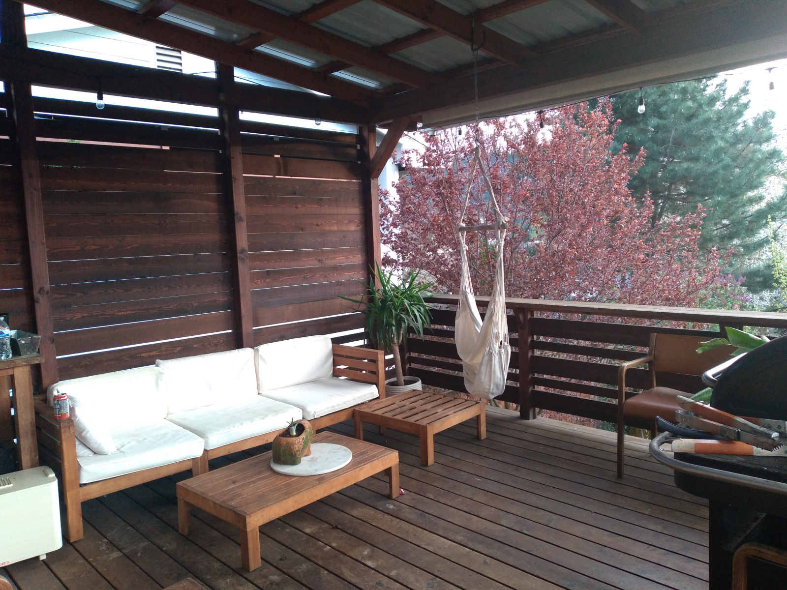 Private deck overlooking the back yard with picturesque views of Forest Park.