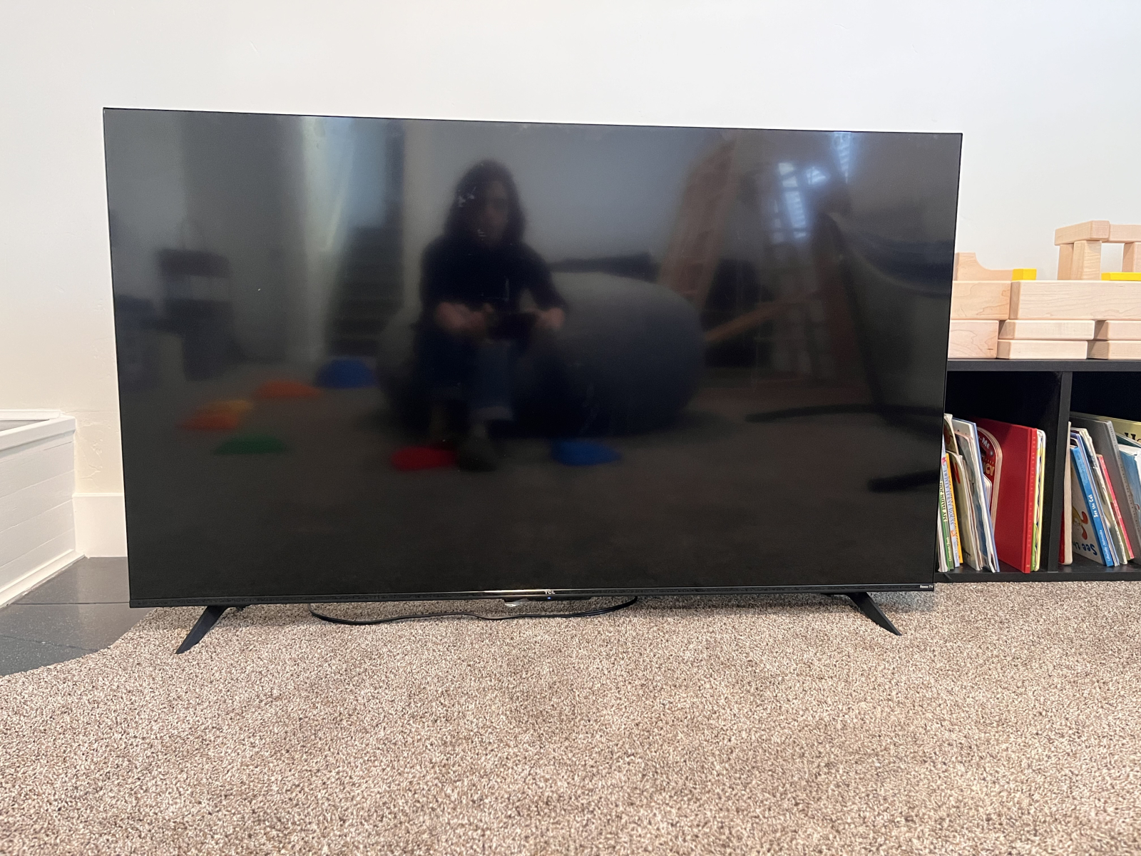 This is our 55” smart Roku “floating TV.” It normally lives in a closet but we sometimes move it *ca ...