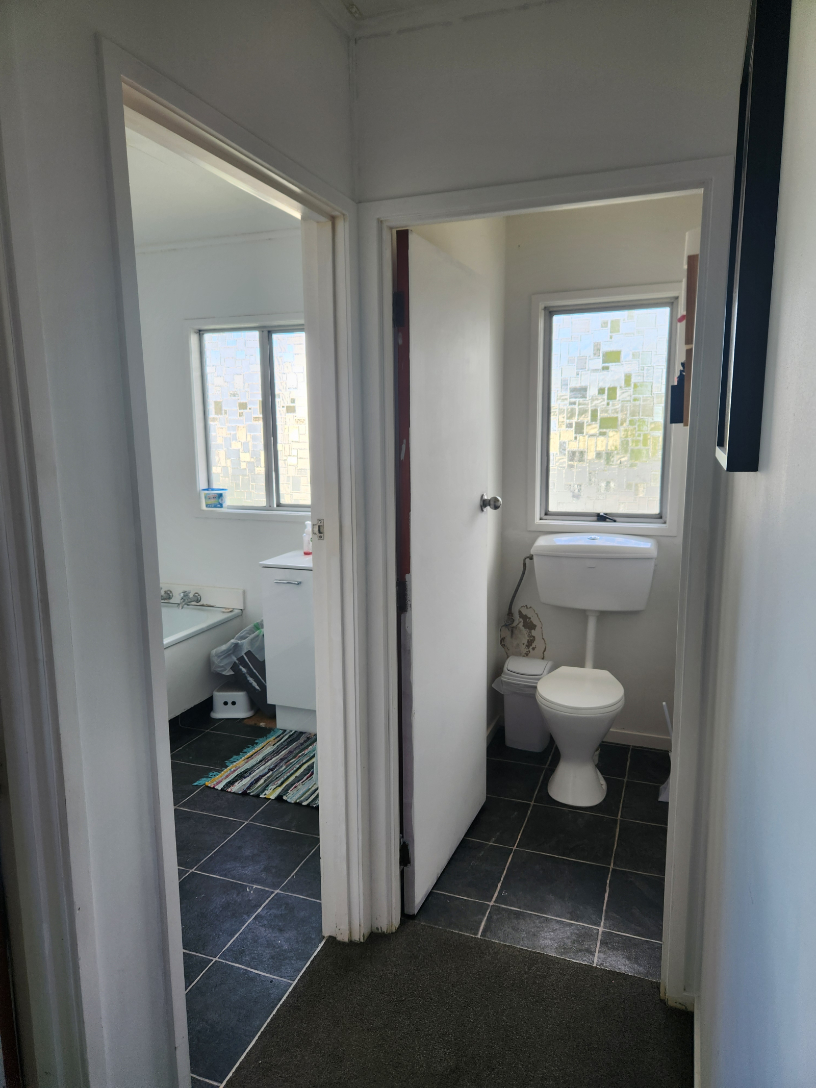Seperate bathroom and toilet.