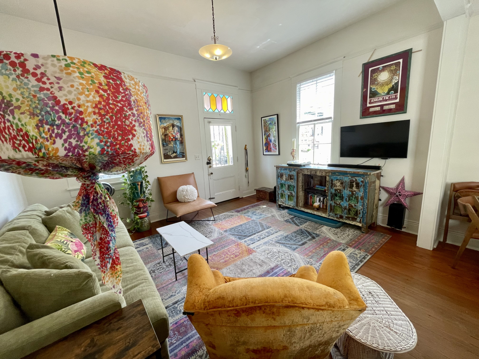 Super comfy and fun and art filled living room.