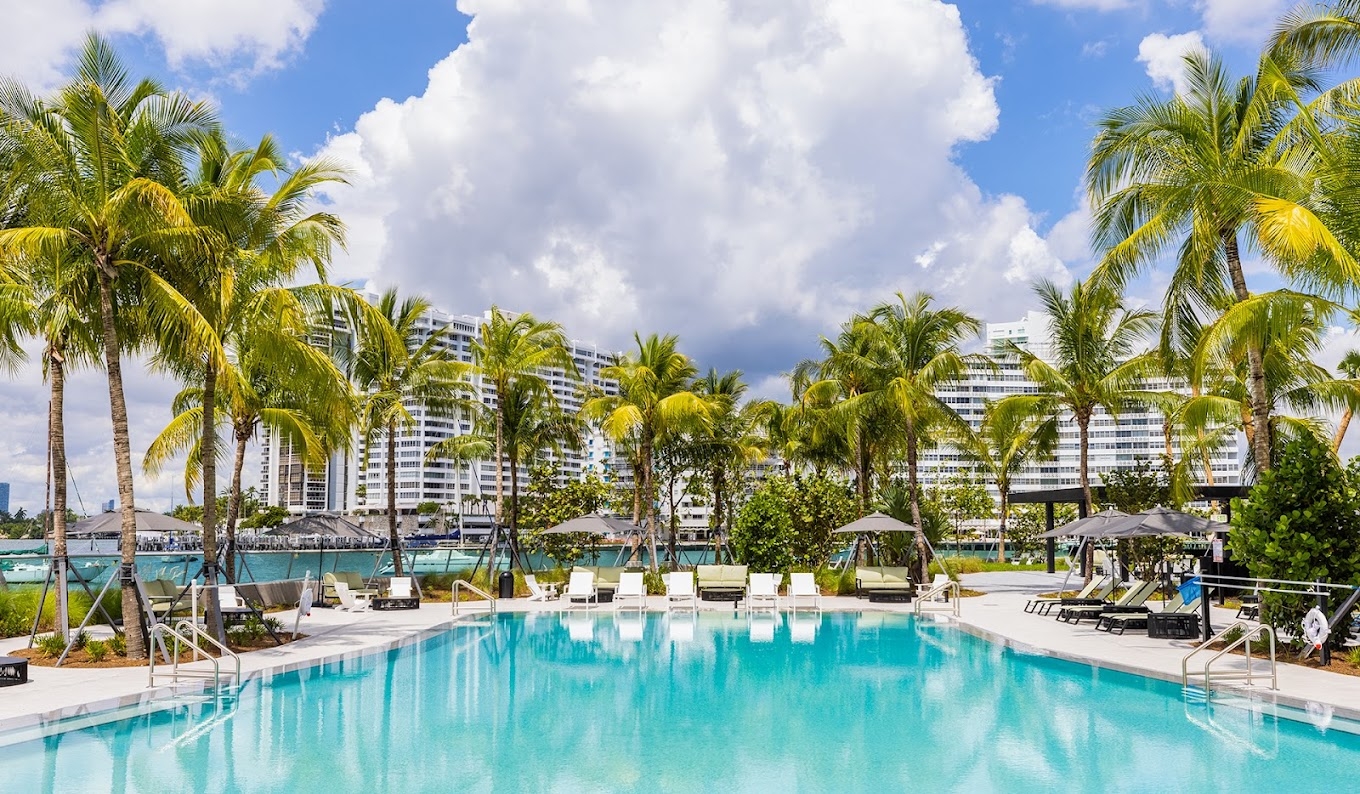Sunny Artist’s Home in South Beach · Sunrise Balcony & Waterfront Pools