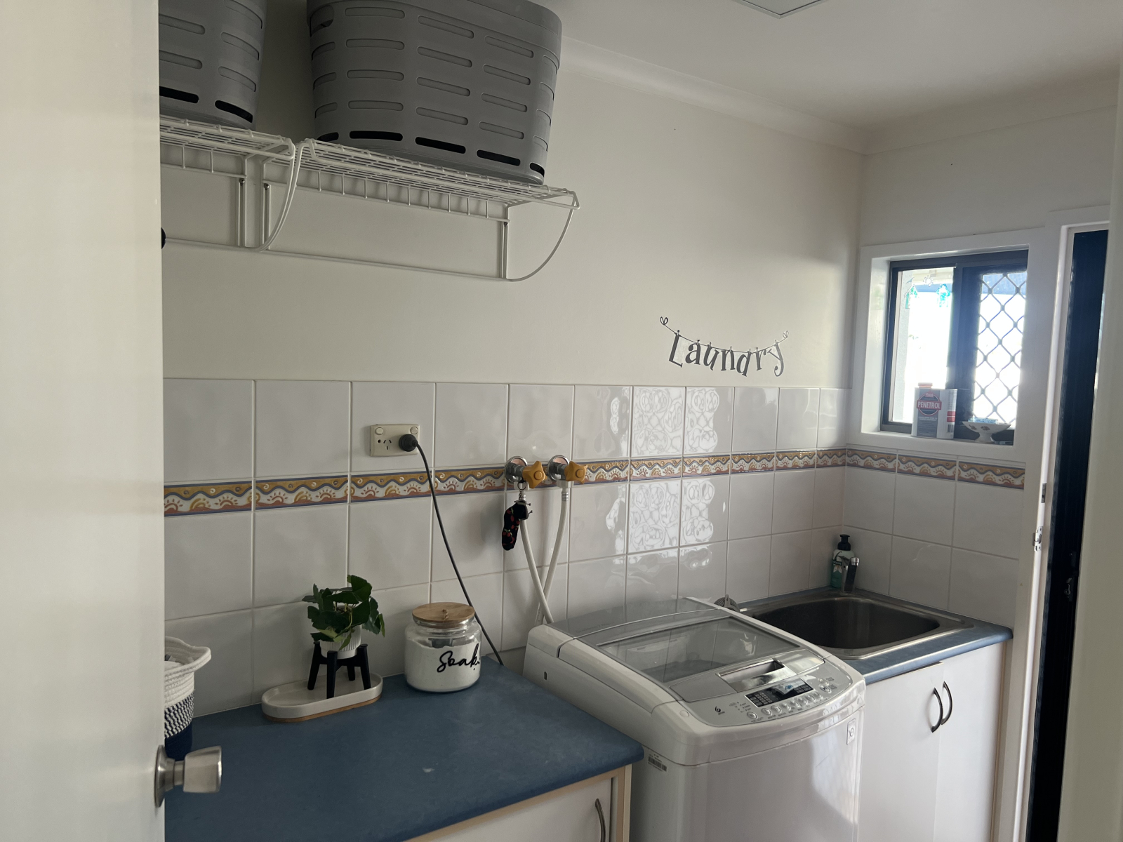 Laundry with washing machine.