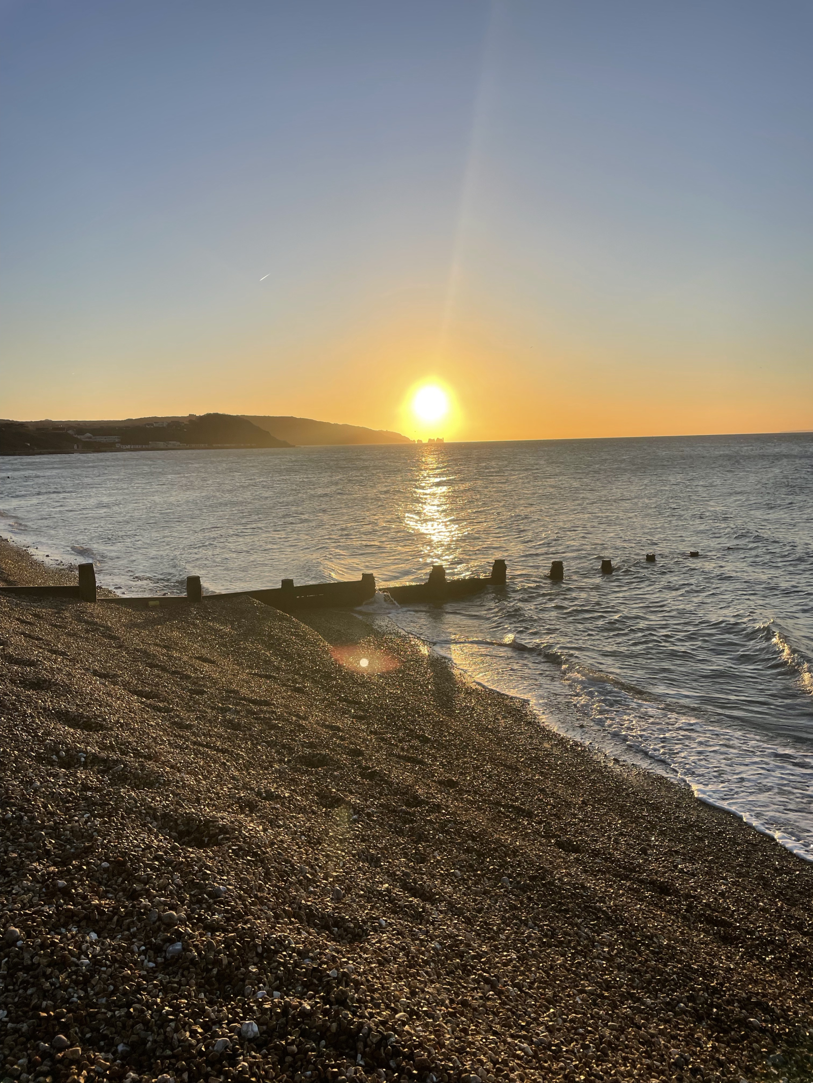 Tramontare sulle iconiche Needles da Colwell Bay (25 minuti a piedi)