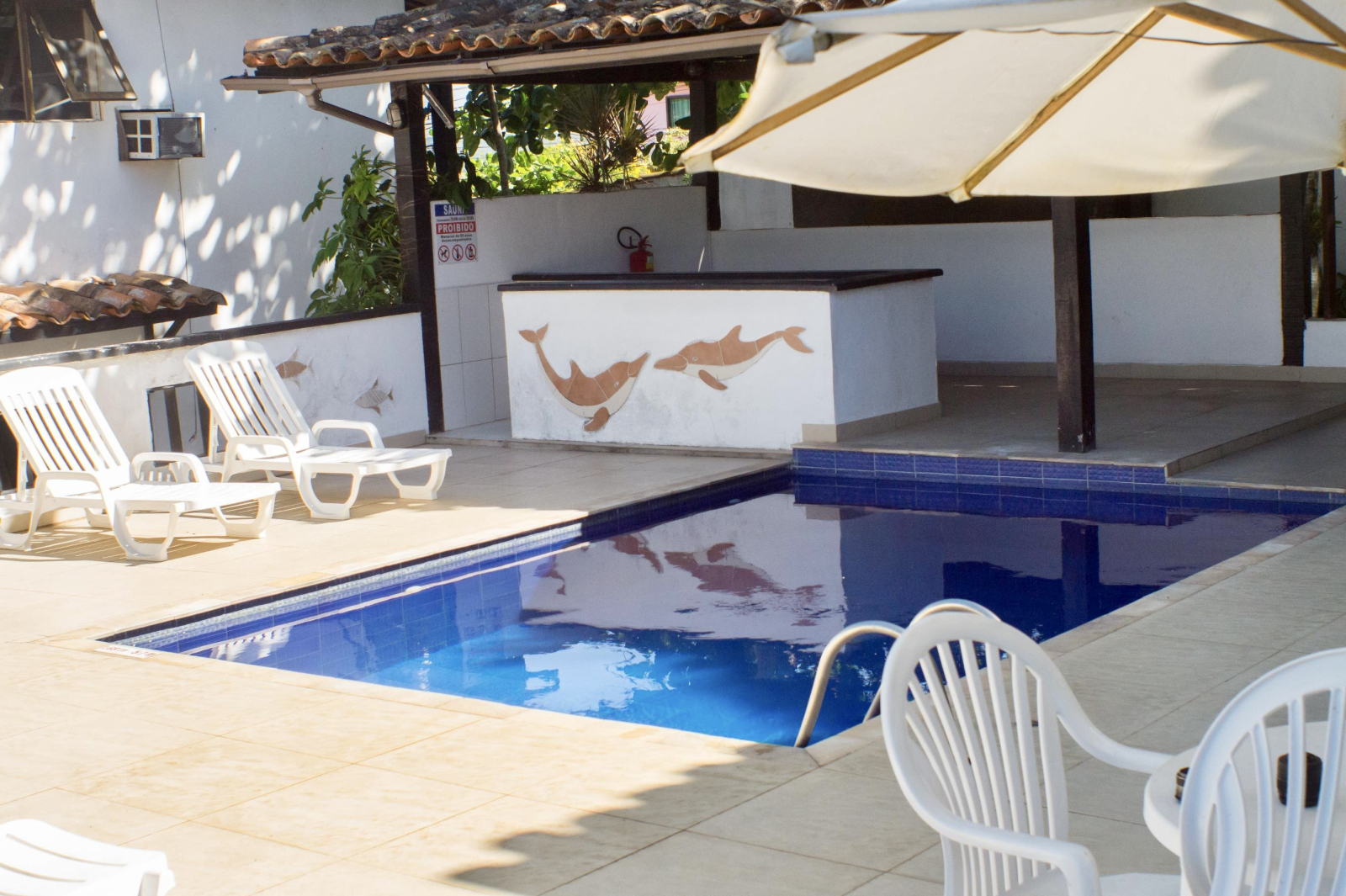 Condomínio piscina compartilhada e entrada para sauna a vapor (sauna)