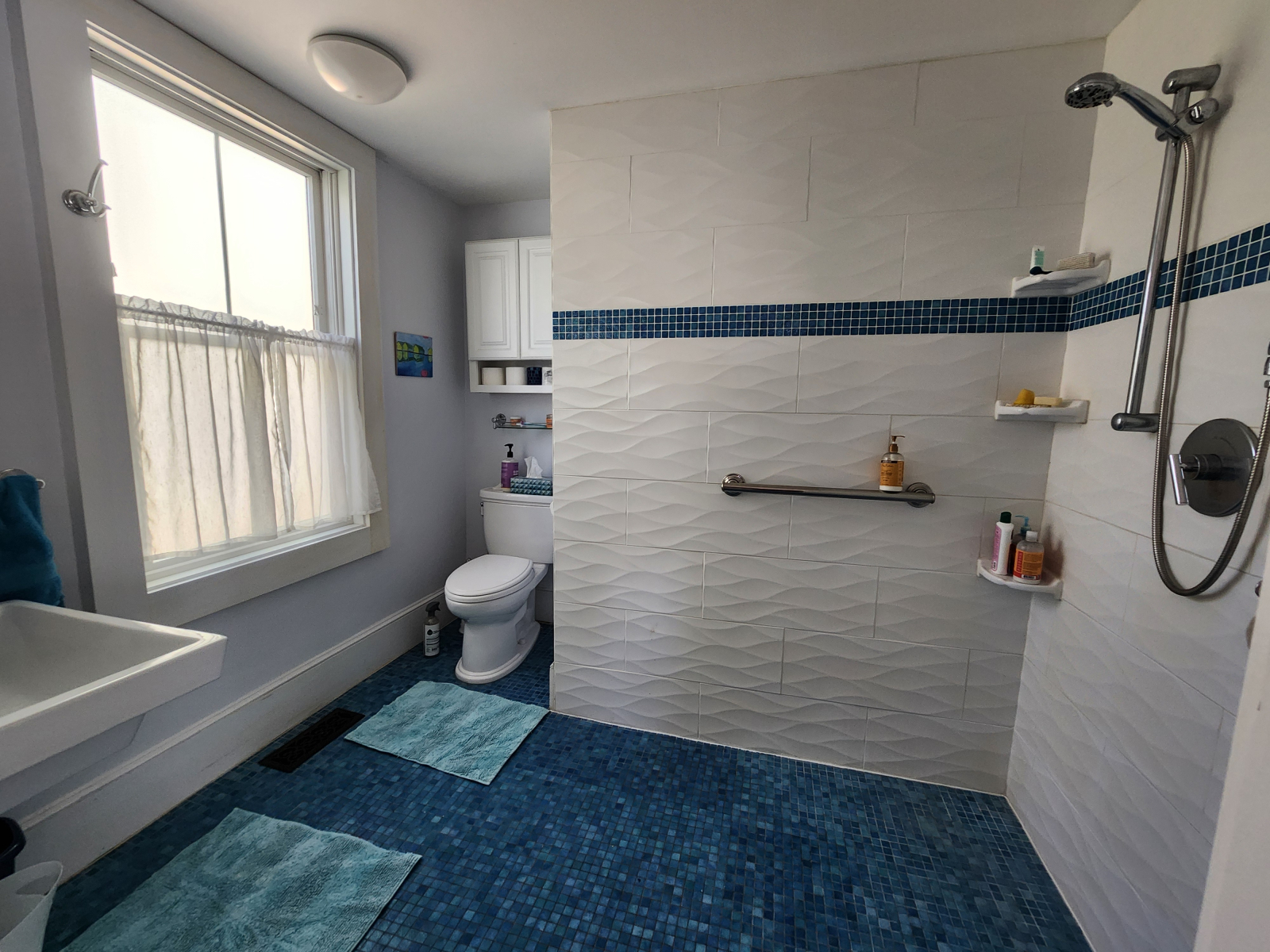 Downstairs bath. There is also a small half bath.