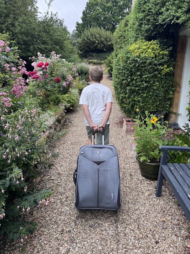 My youngest walking away from our home - he likes to travel!