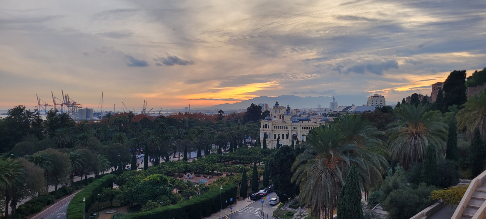 Sunset over Muelle Uno harbour and the old town
