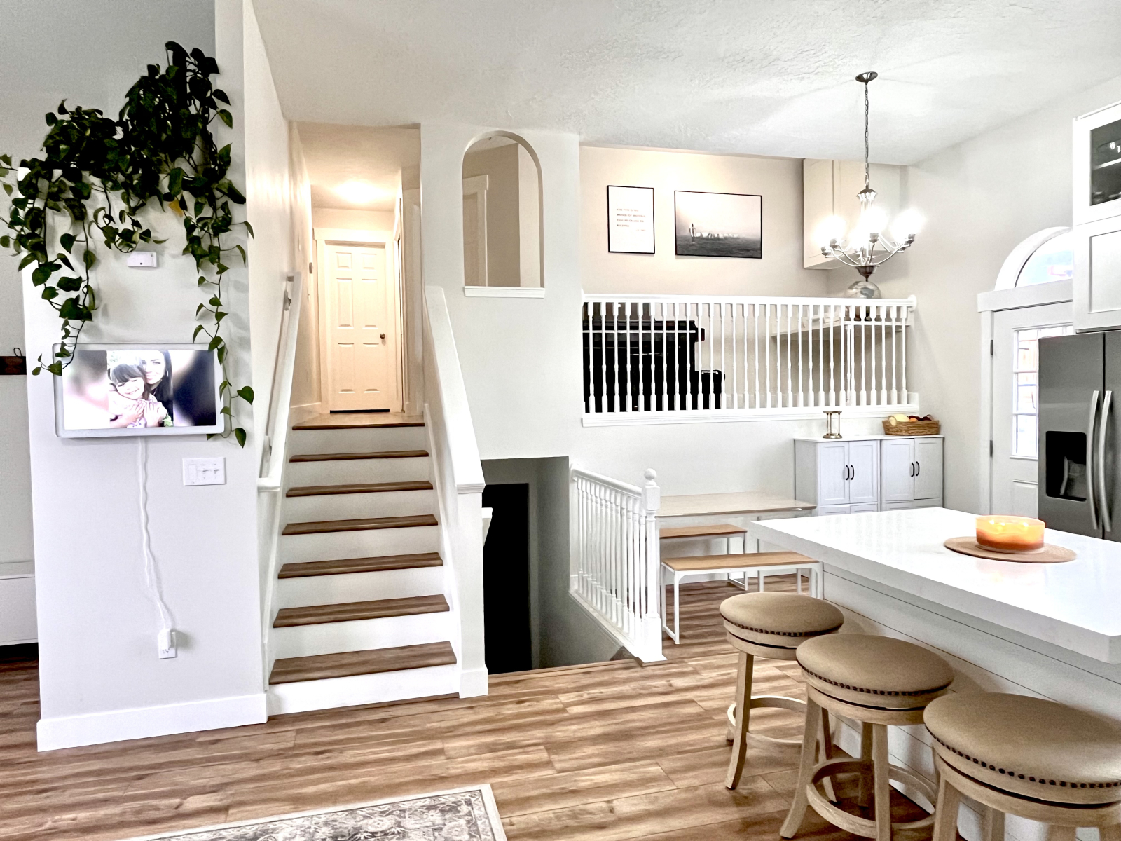 Stairs up lead to the first bathroom (full) the primary bedroom with sleep number king bed and full, ...