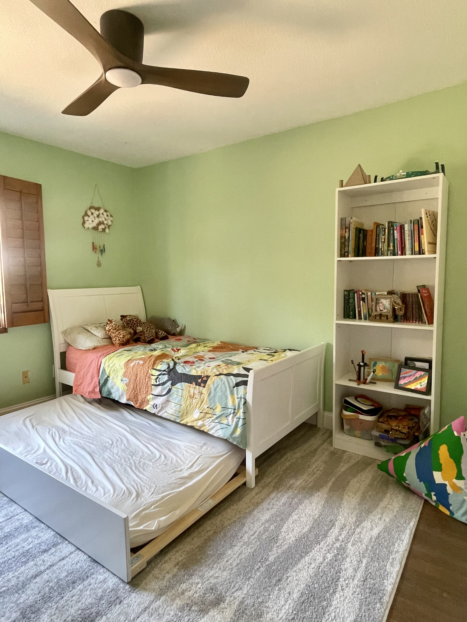 Twin bed with roll-out trundle