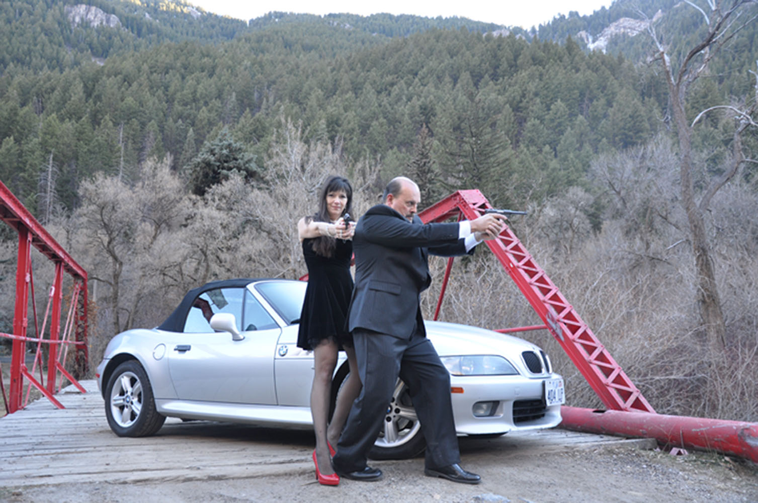 2013 Christmas card with Dylan and Rick as "The Bonds." (That is Dylan's vintage BMW with our forest ...