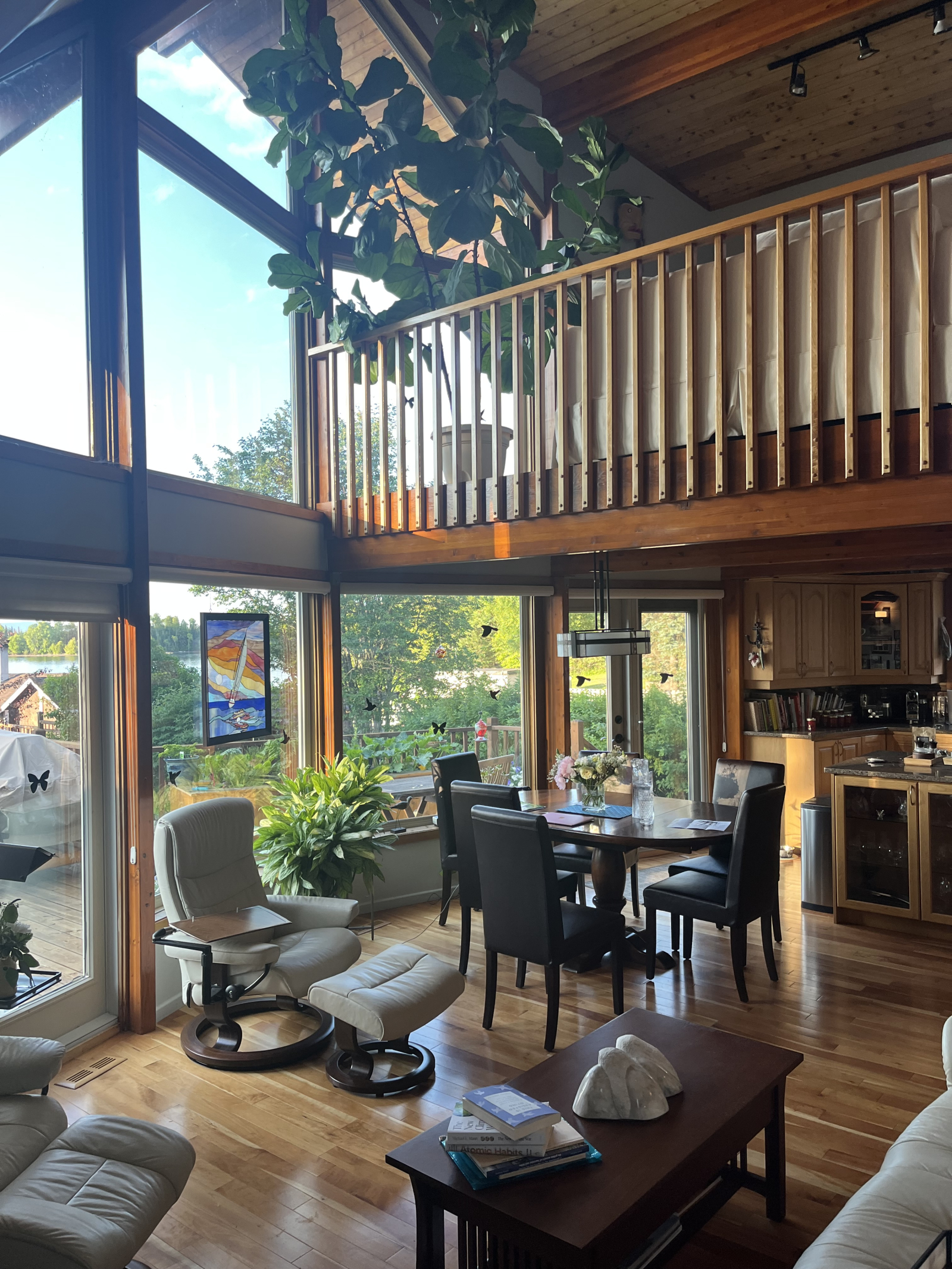 The living room looking up to the loft