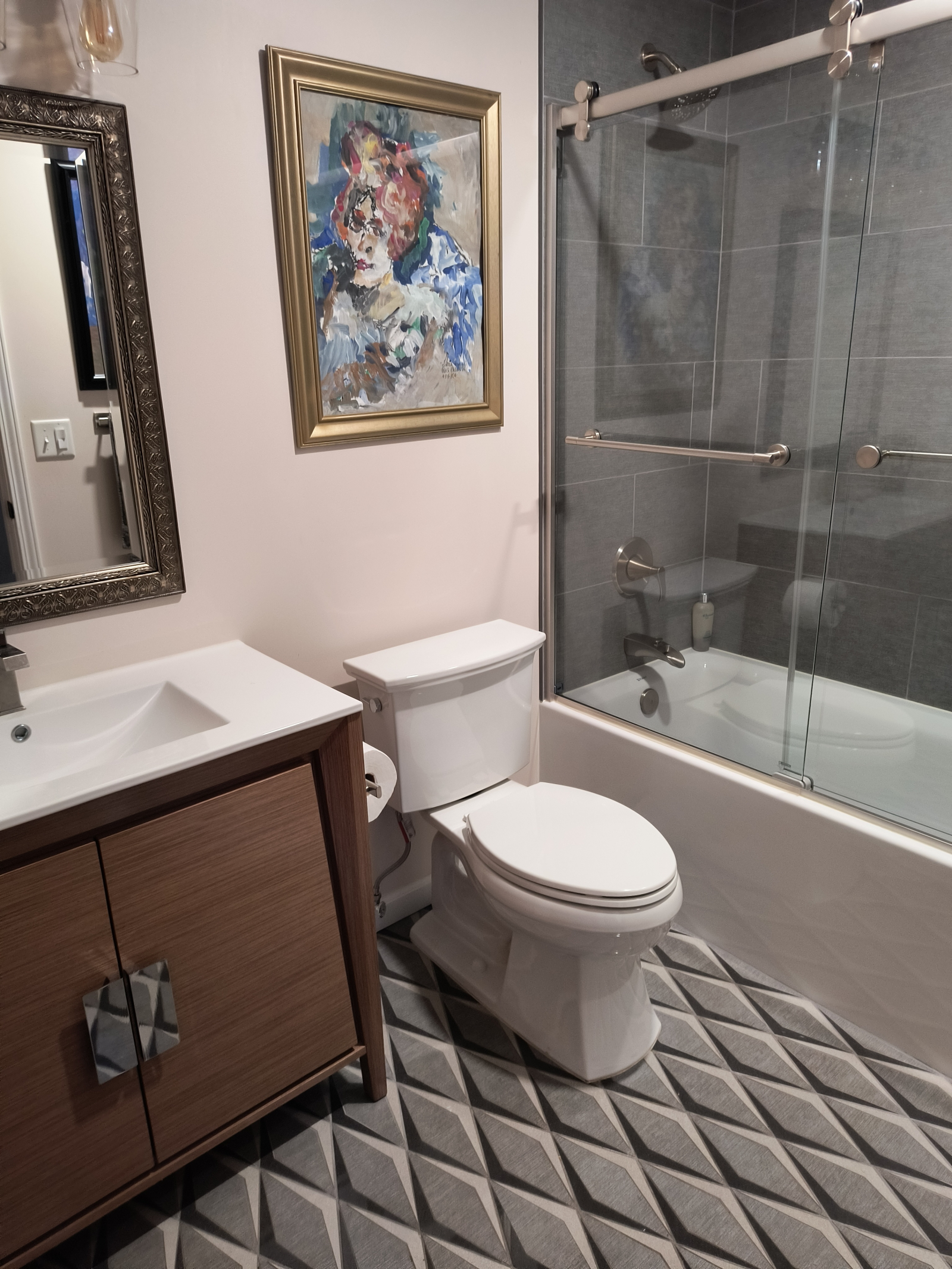 First bathroom with shower and bathtub