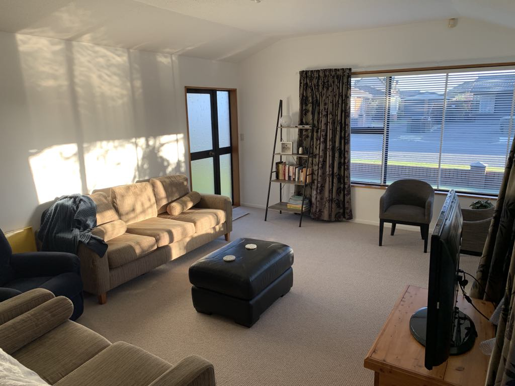 Living room looking back towards the front door