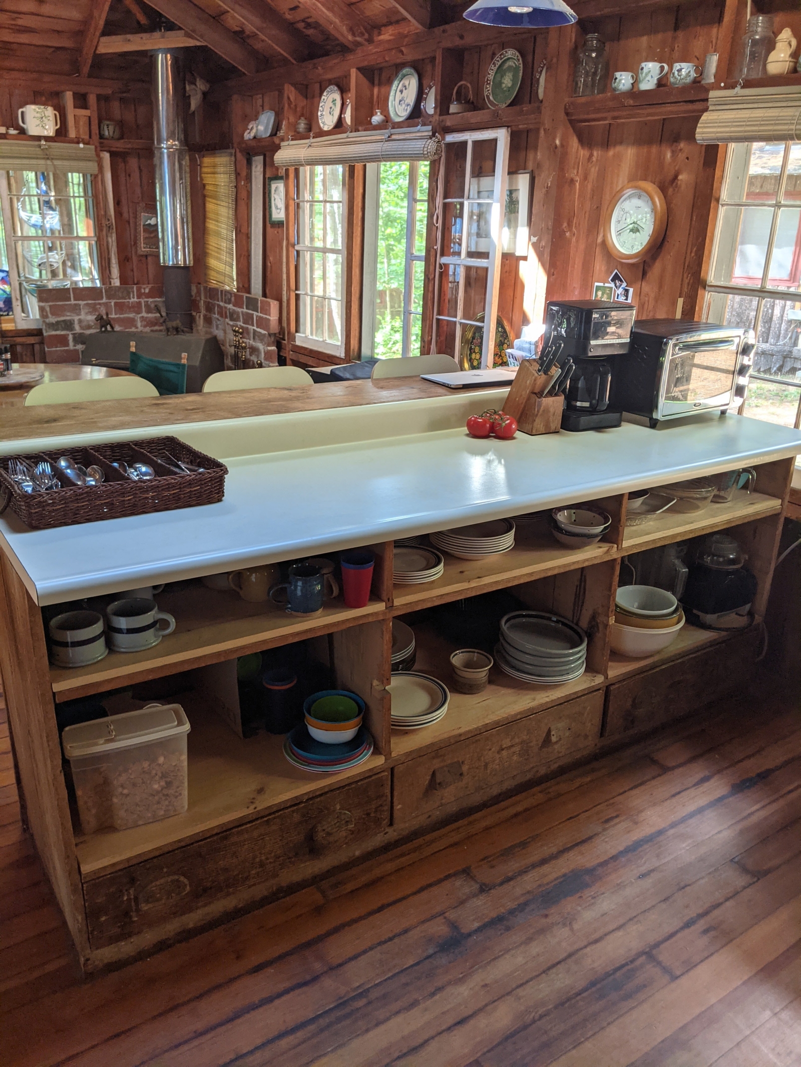 Family cabin at former sleepaway camp with docks, kayaks, and field