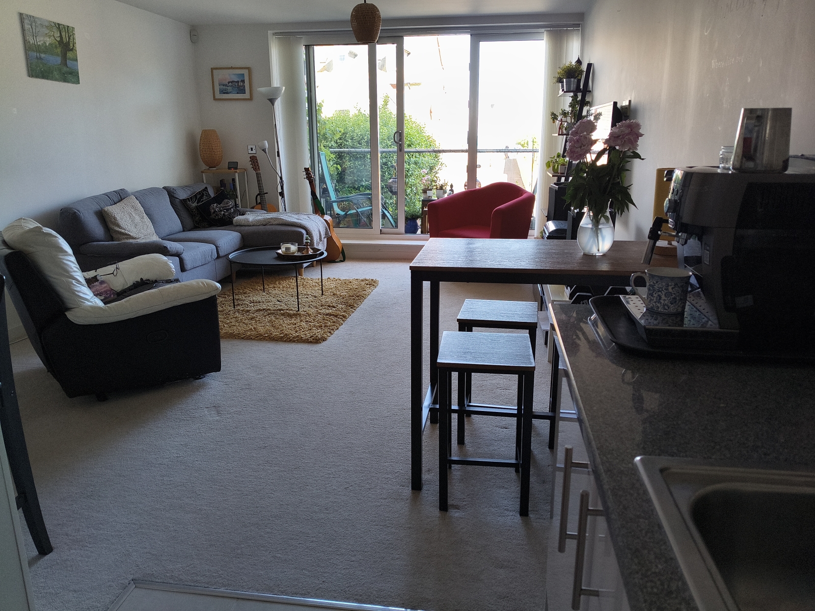 Living room and balcony.