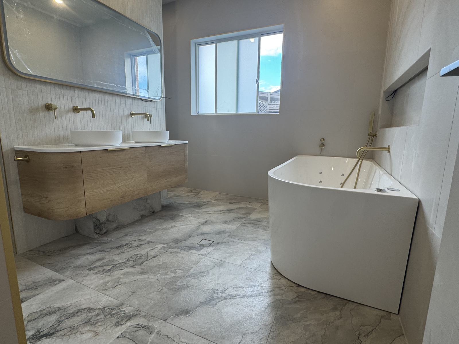 Our beautiful new main bathroom, complete with spa bath and separate shower and toilet.
