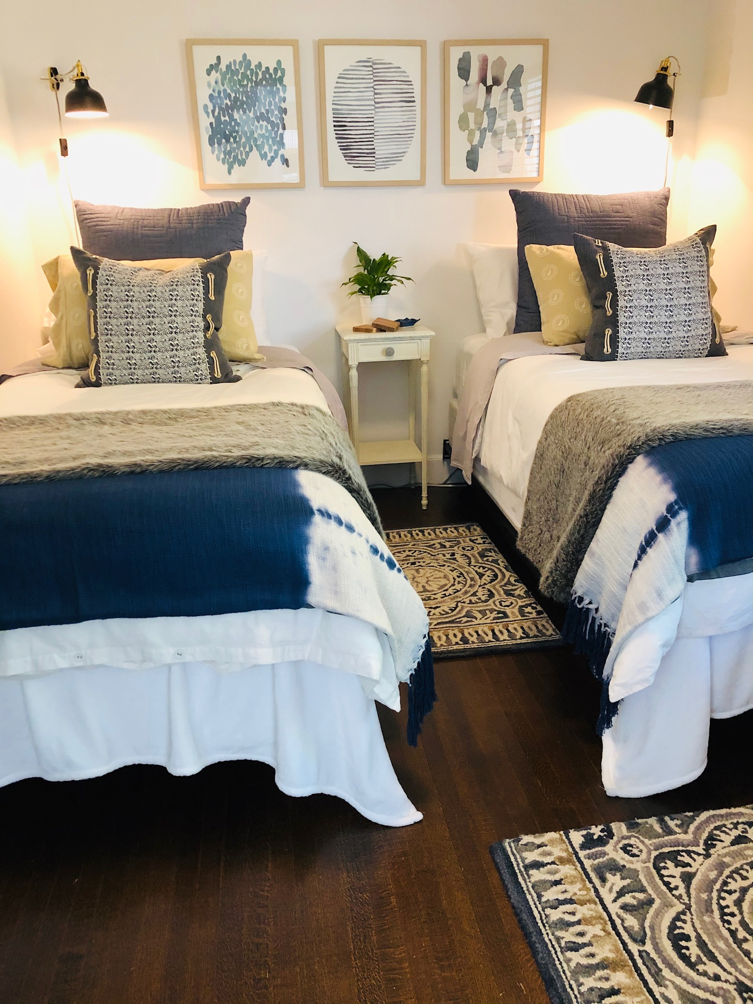 Twin XL bedroom with a view of the garden and a TV