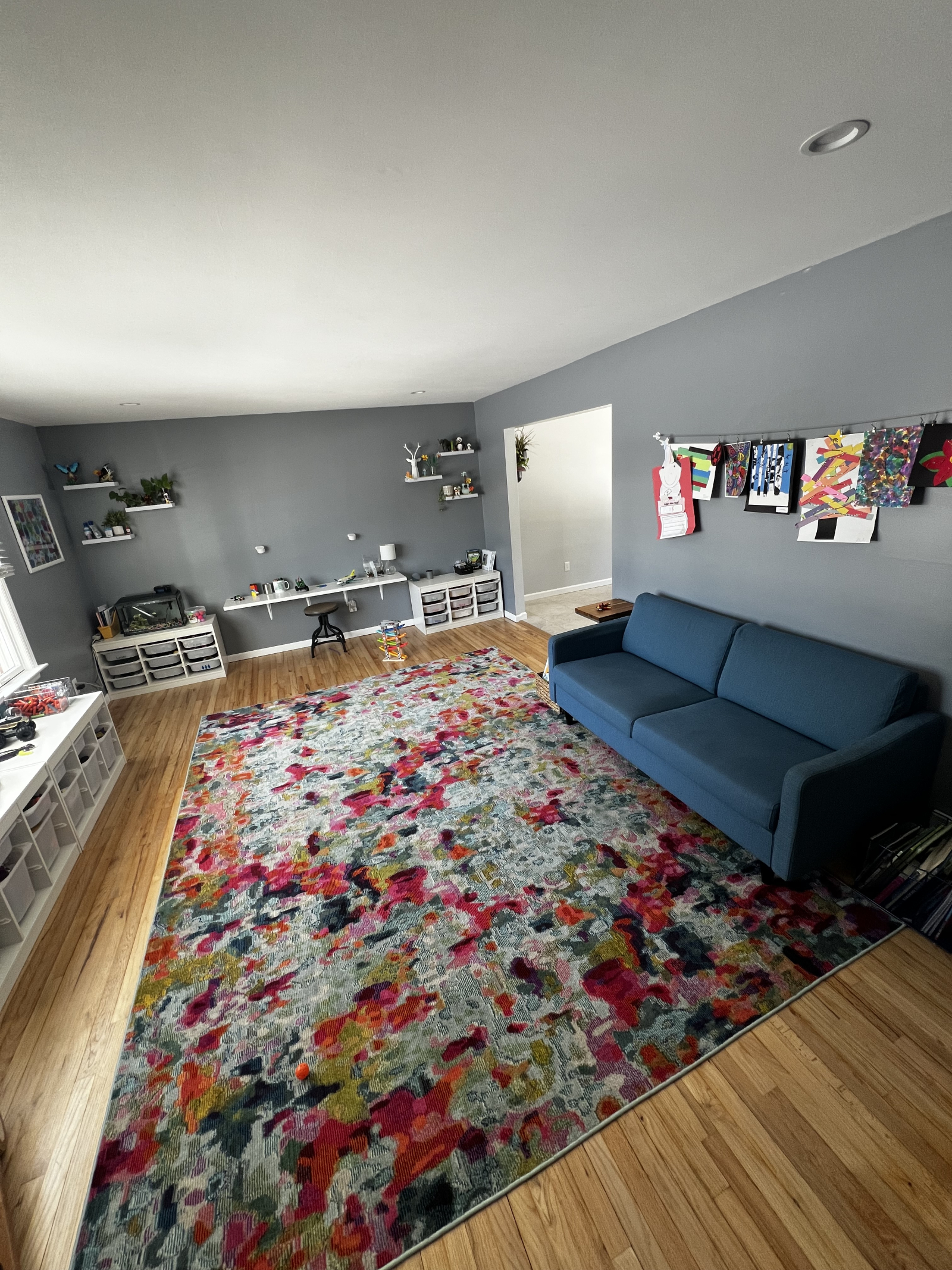 Our bright front sitting room / play room with lots of Legos, magnet tiles, and toys