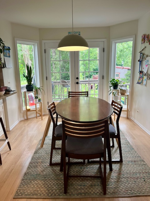 Breakfast nook next to kitchen, french doors open to our gigantic backyard & easy access to grill