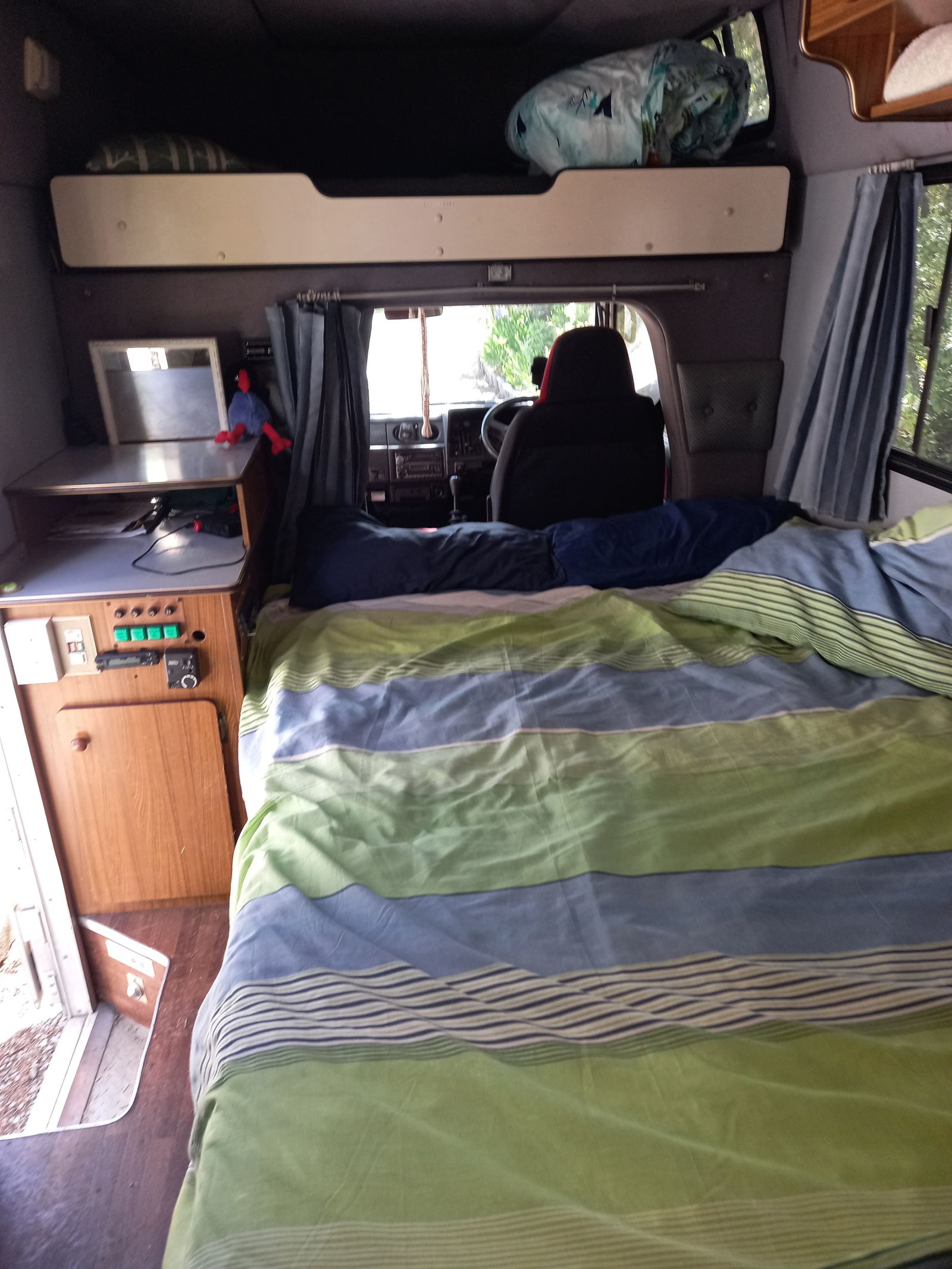 Very comfy double bed with extra mattress layer which can be folded up when using the table and seat ...