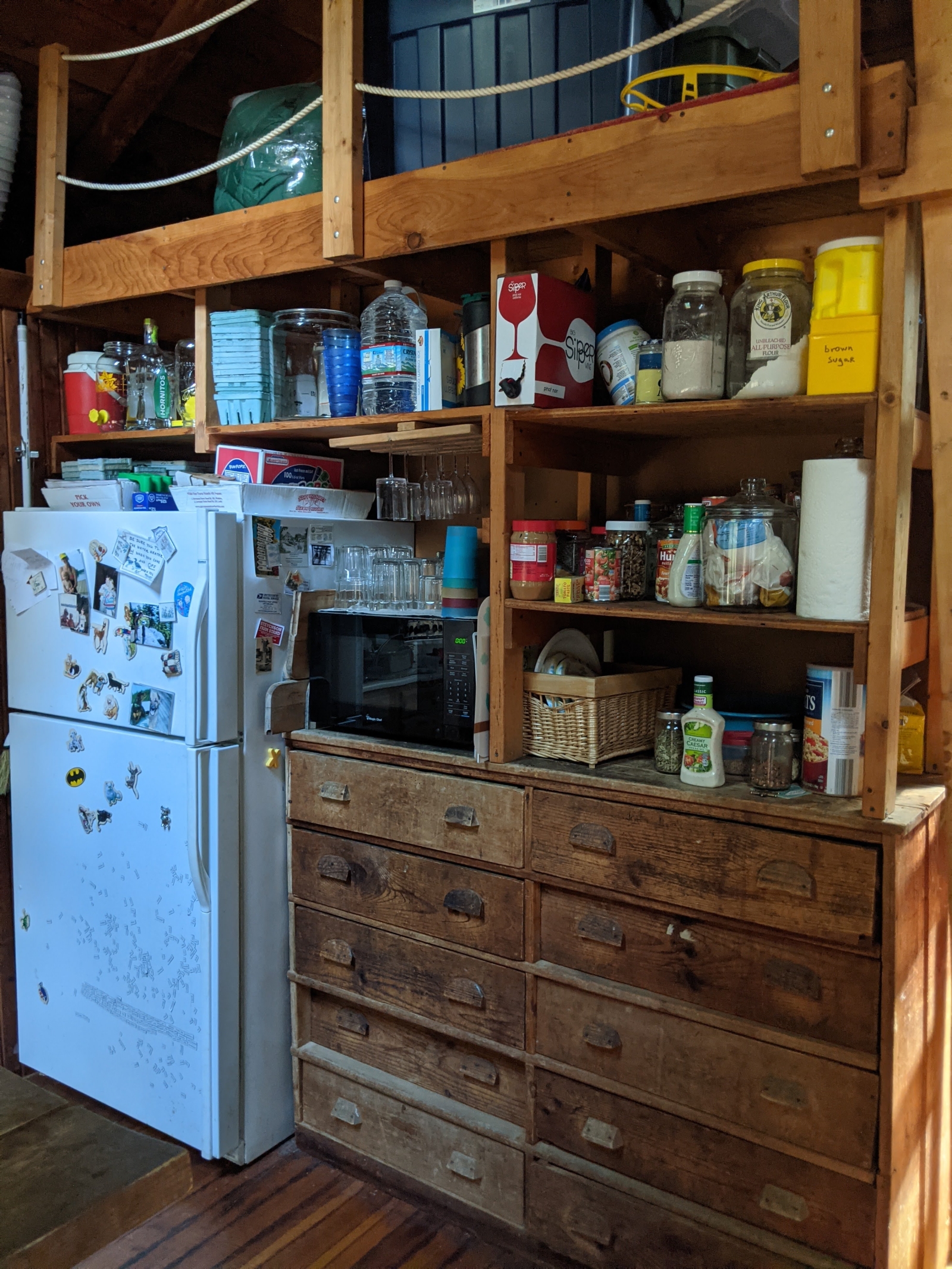 Family cabin at former sleepaway camp with docks, kayaks, and field