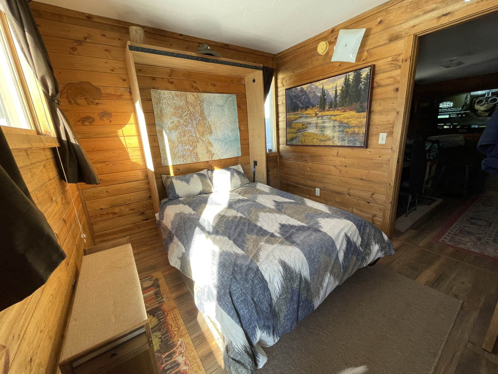 Bedroom #2 with full sized (homemade) Murphy bed open.  This room has access to outside.