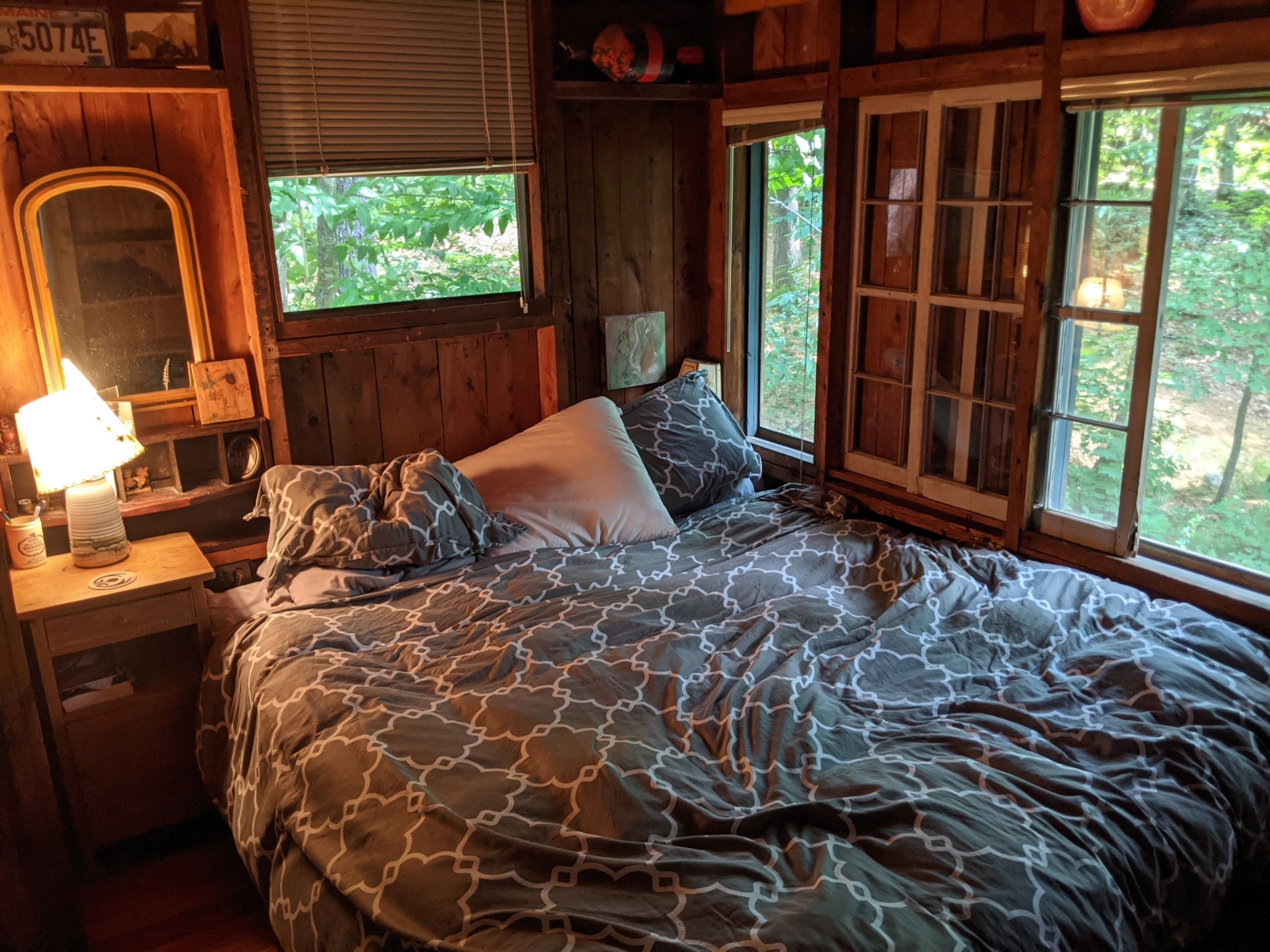 Family cabin at former sleepaway camp with docks, kayaks, and field