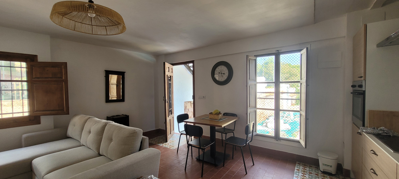 cozy but well formed open kitchen/dining and lounge