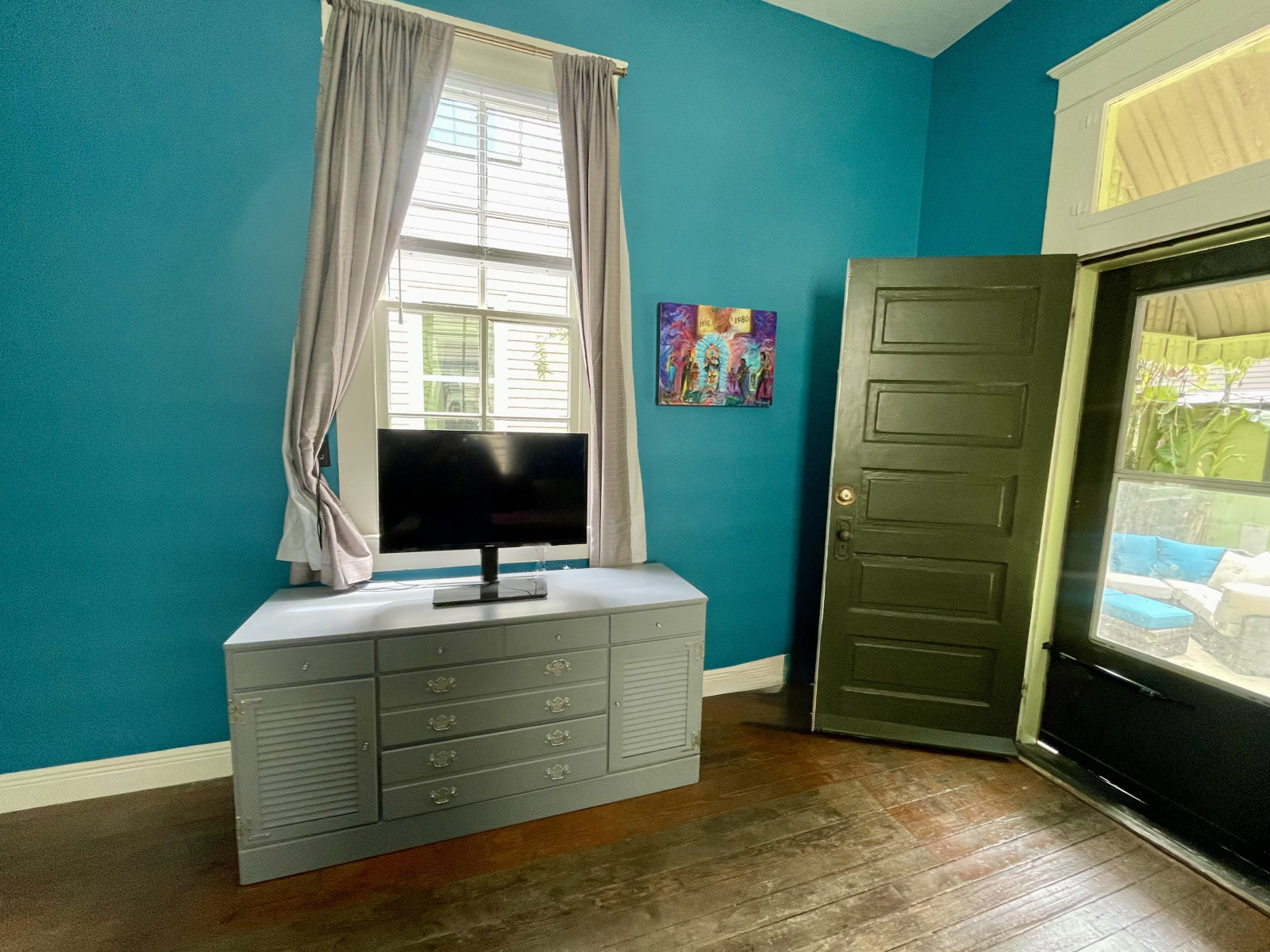 Room darkening curtains keep the back bedroom cool and dark but when you want to let the light and sunshine in the back door is great!
