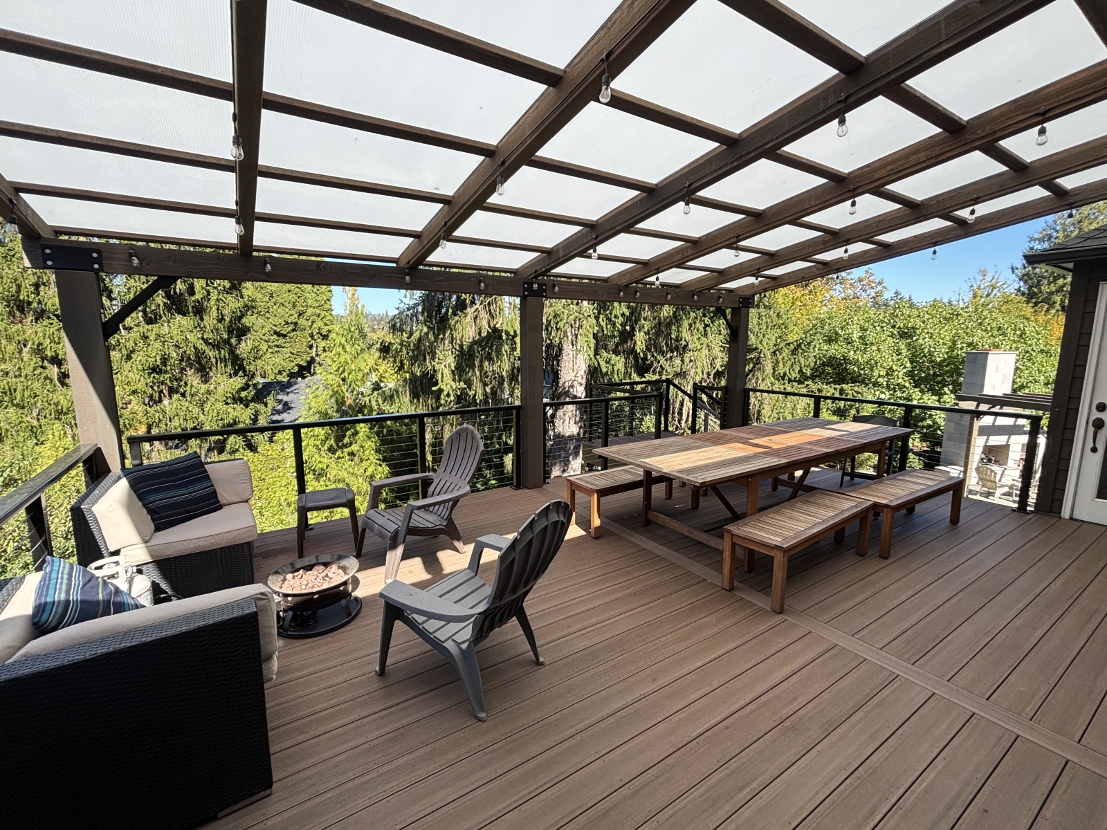 Brand new covered upper deck with charcoal and gas grills below for 3-season dining!