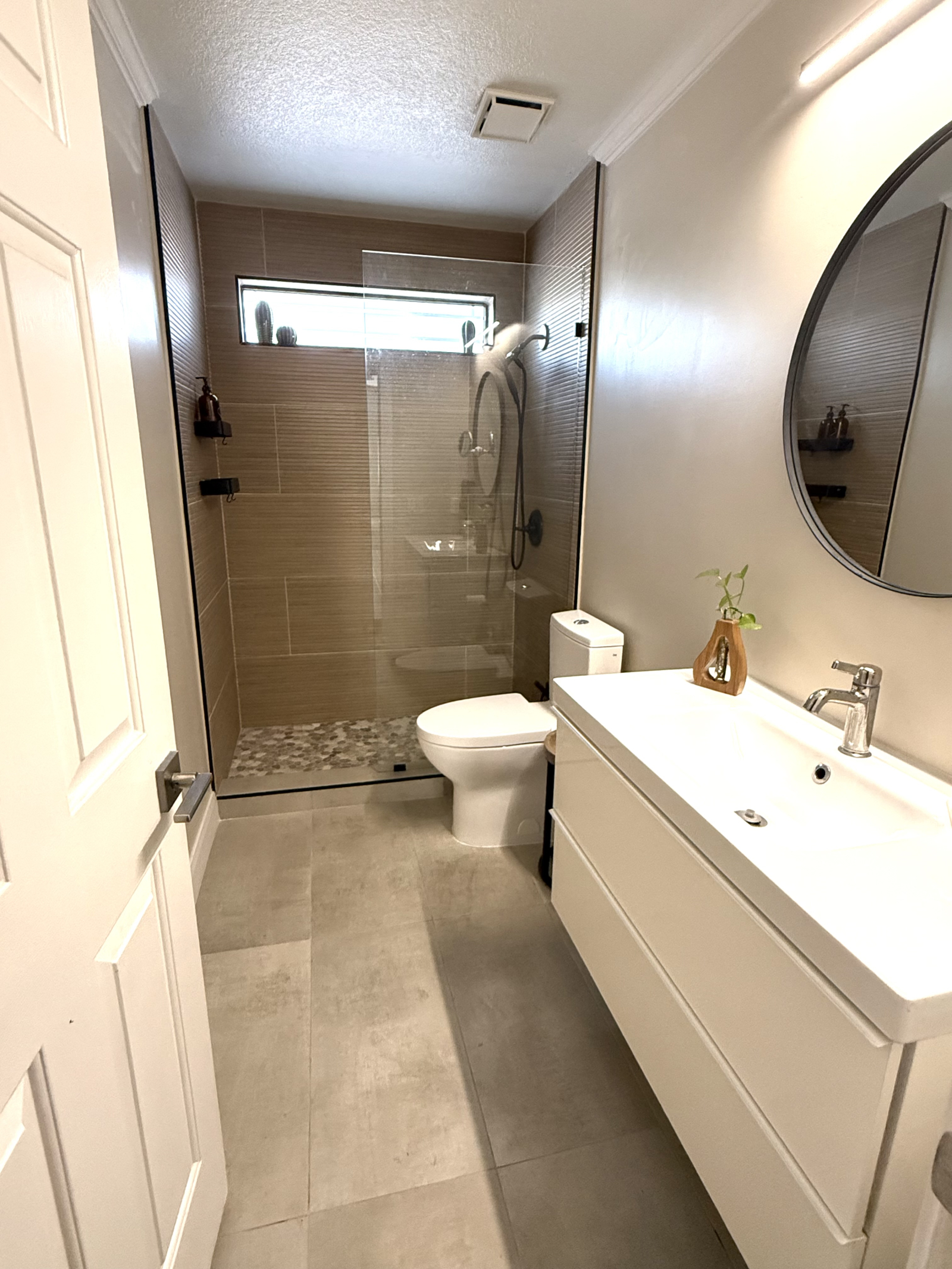 Guest bathroom.  Our latest renovation. Needs some finishing touches: towel racks and shelving and w ...