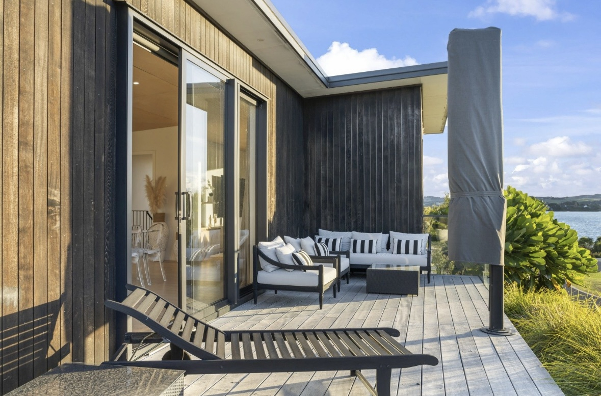 The front deck faces north west, with views of the estuary.