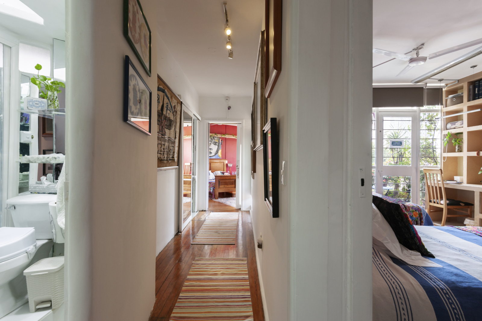 HALL THAT CONNECTS ROOMS & BATHROOMS