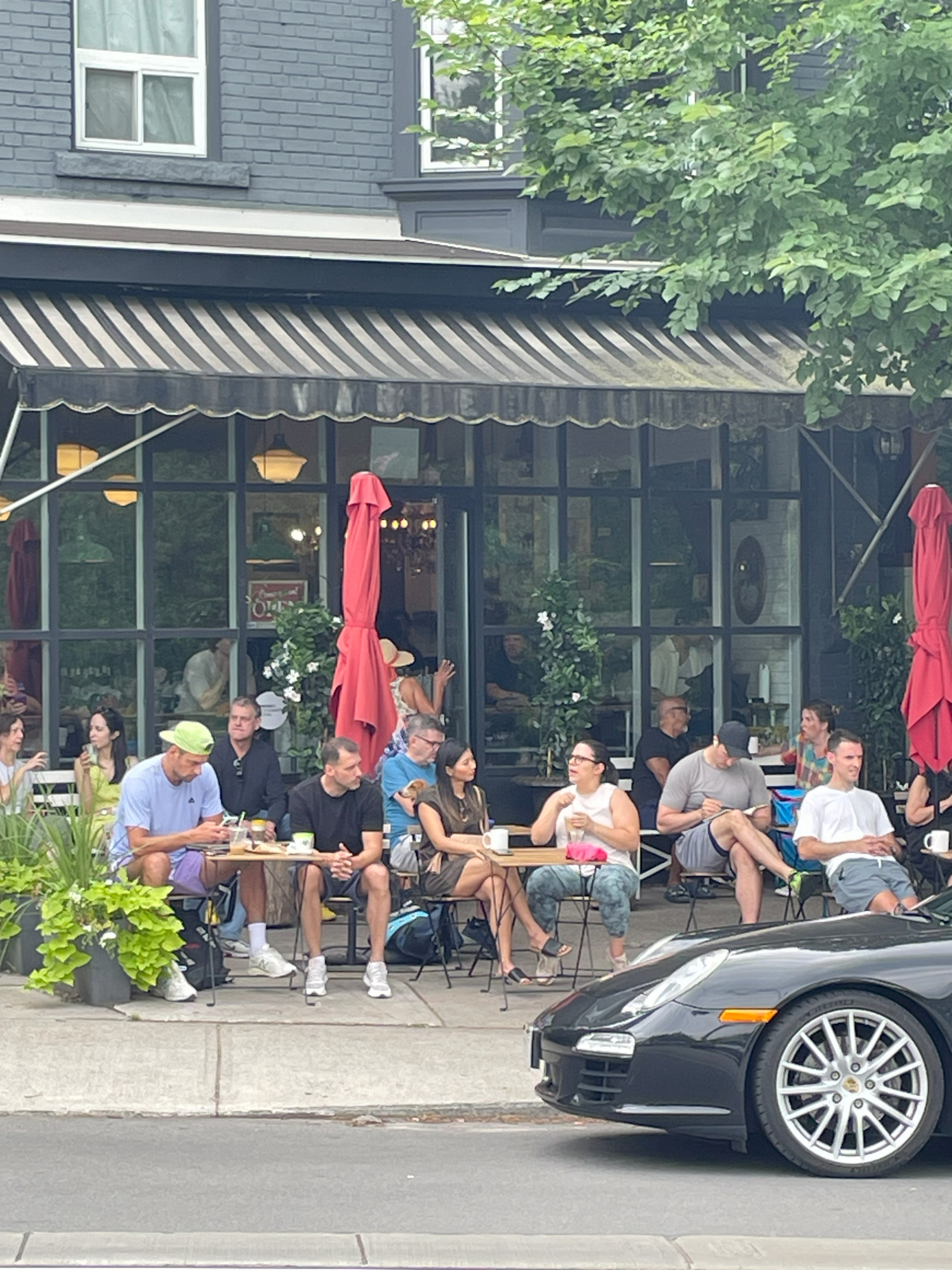 Popular Rooser Cafe overlooking a park with skyline view. 10 min walk.