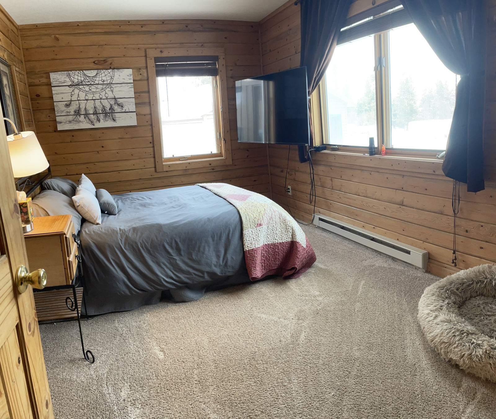 Master bedroom, full sized bed. Looks out over shadow Mountain Lake.