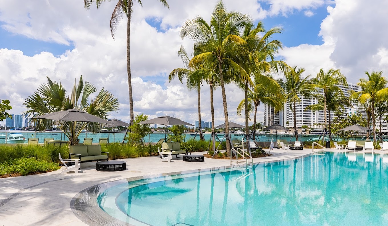 Sunny Artist’s Home in South Beach · Sunrise Balcony & Waterfront Pools